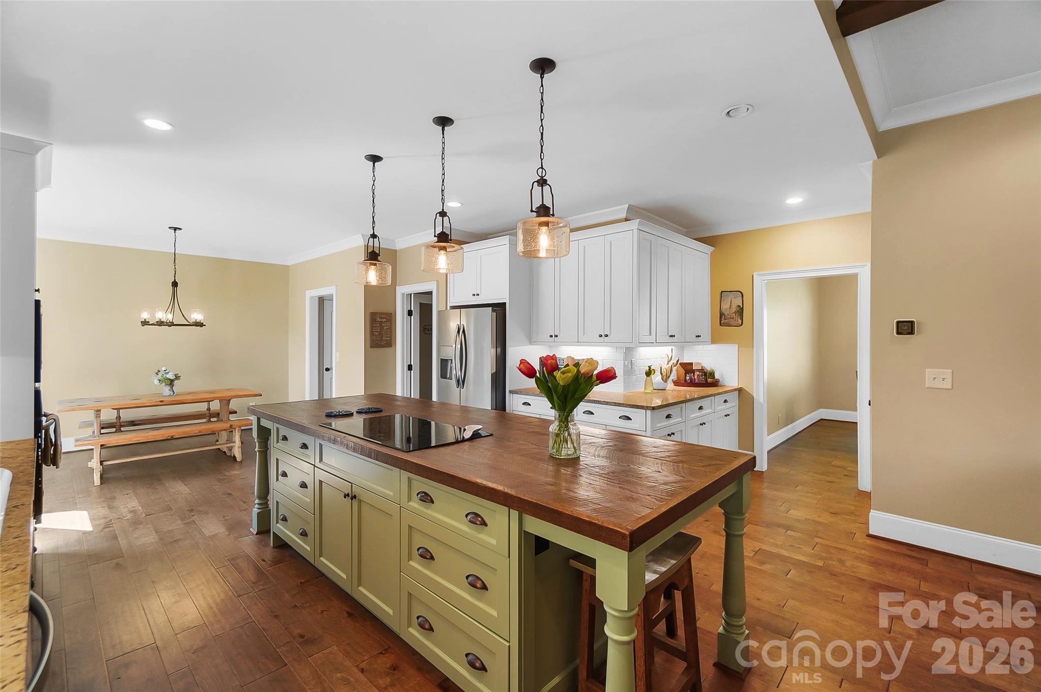Kitchen island and breakfast area - 3612 Lake Twitty Drive, Monroe