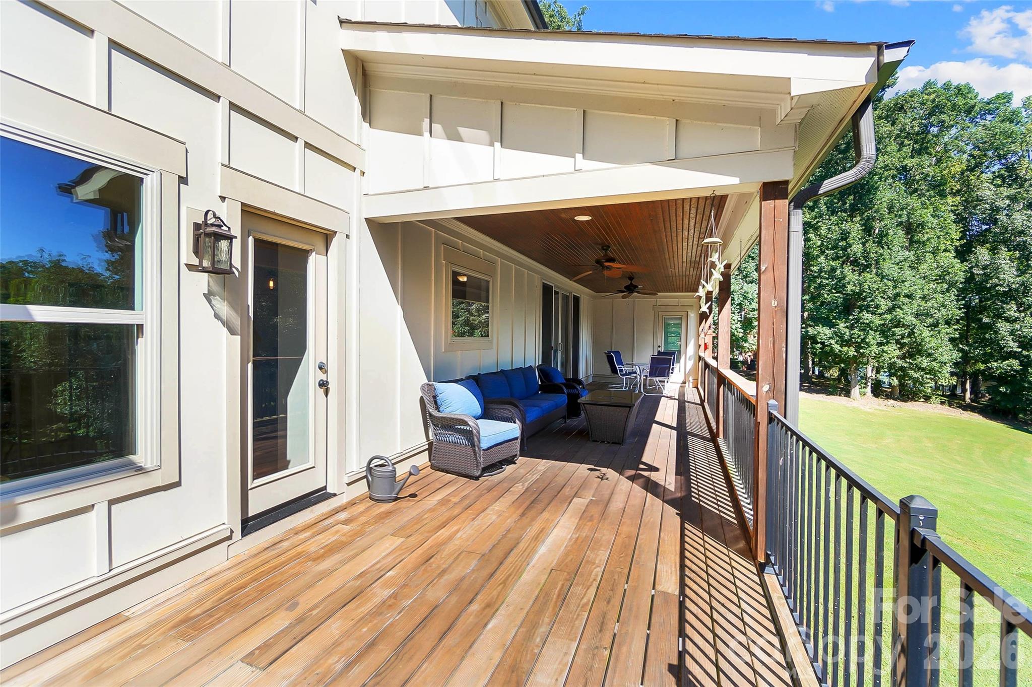 Covered deck overlooking the backyard - 3612 Lake Twitty Drive, Monroe