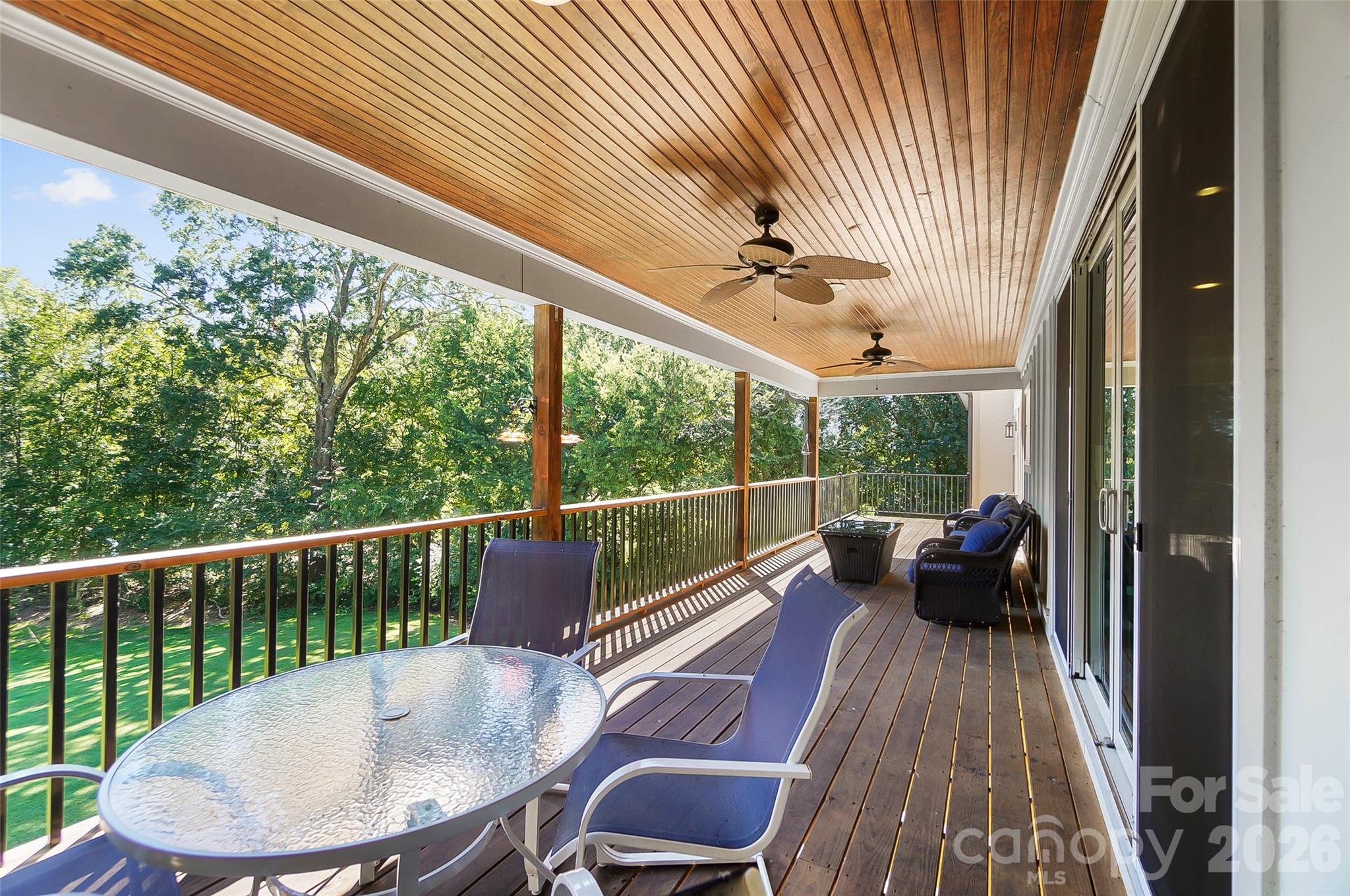 Covered deck with outdoor seating - 3612 Lake Twitty Drive, Monroe