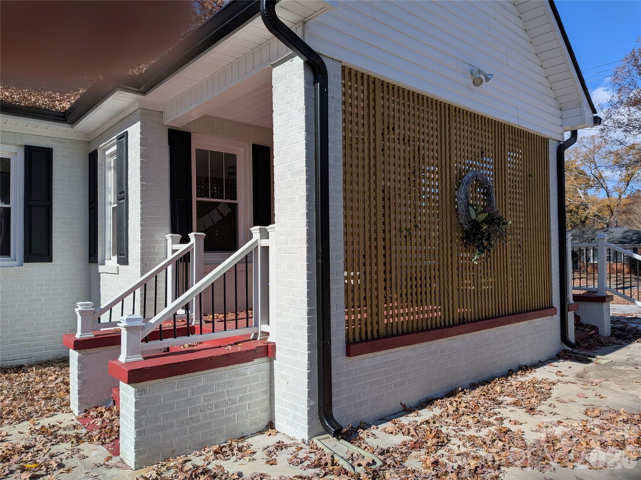 Porch steps. Railings & posts all low maintenance. - 933 W Warren Street, Shelby