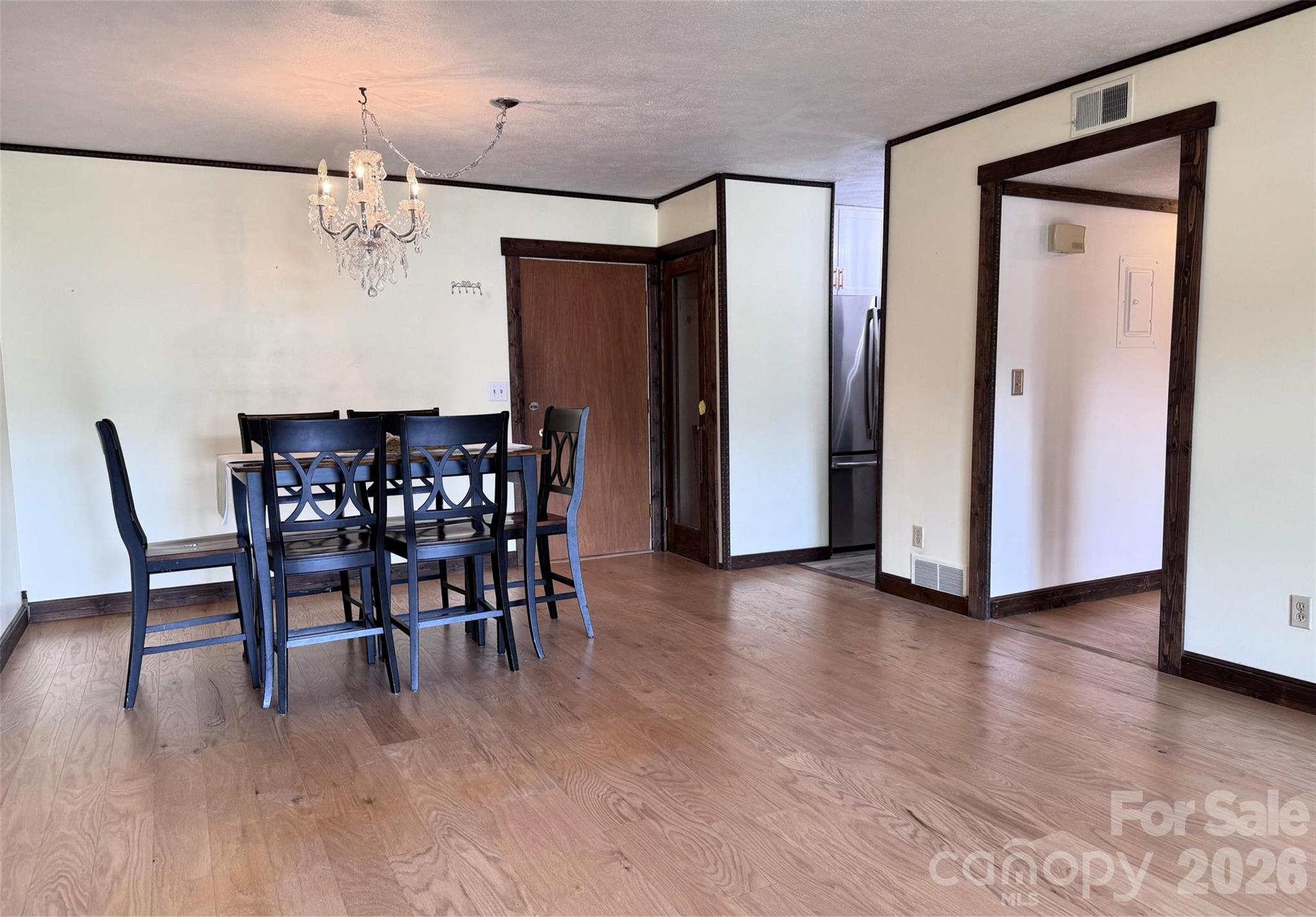 Dining area, table and chairs to convey. - 427 6th Avenue W, Hendersonville
