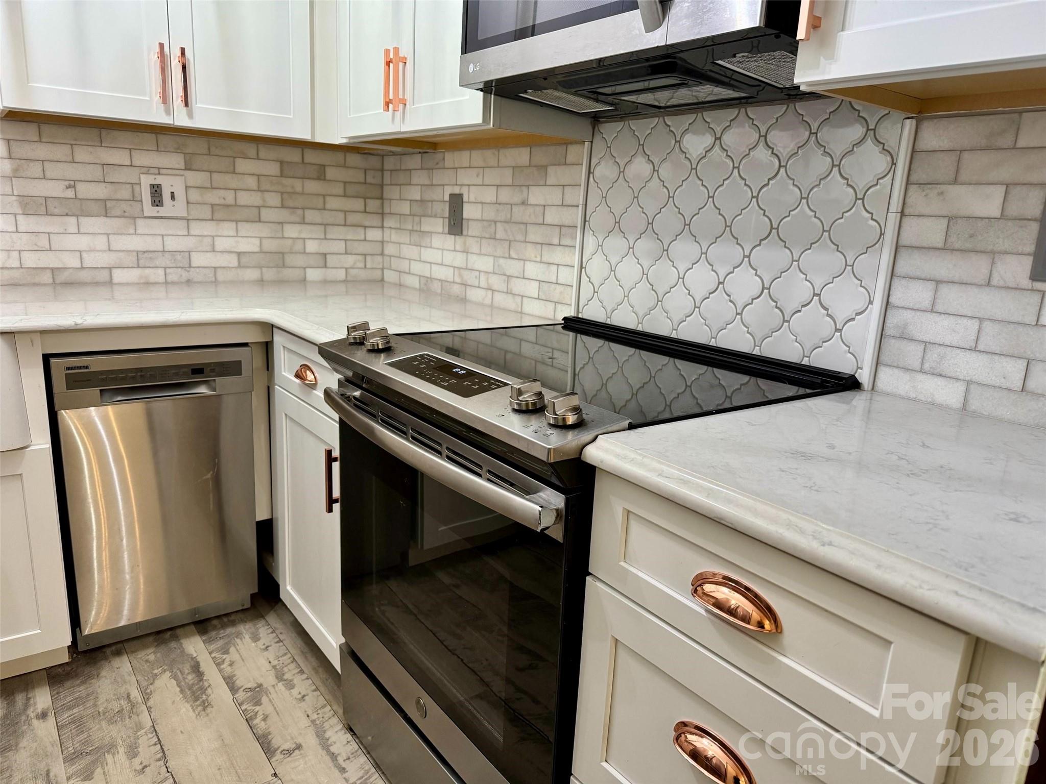 New appliances, countertops and cabinets. - 427 6th Avenue W, Hendersonville