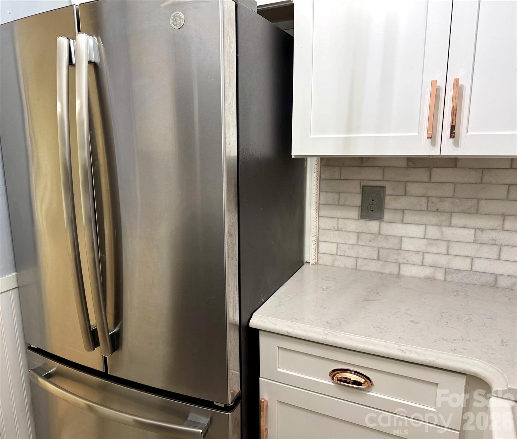 Full-size refrigerator with ice maker. - 427 6th Avenue W, Hendersonville