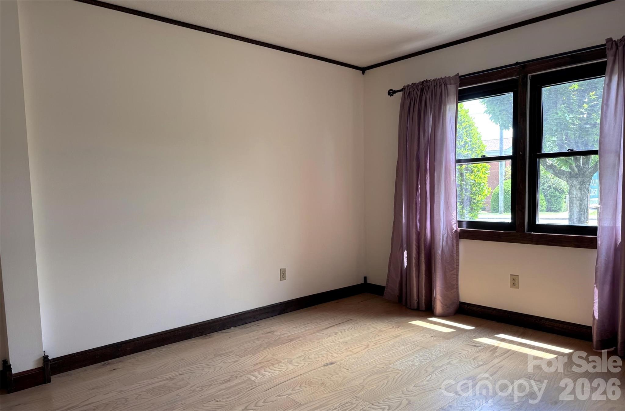 Primary bedroom, freshly painted. - 427 6th Avenue W, Hendersonville