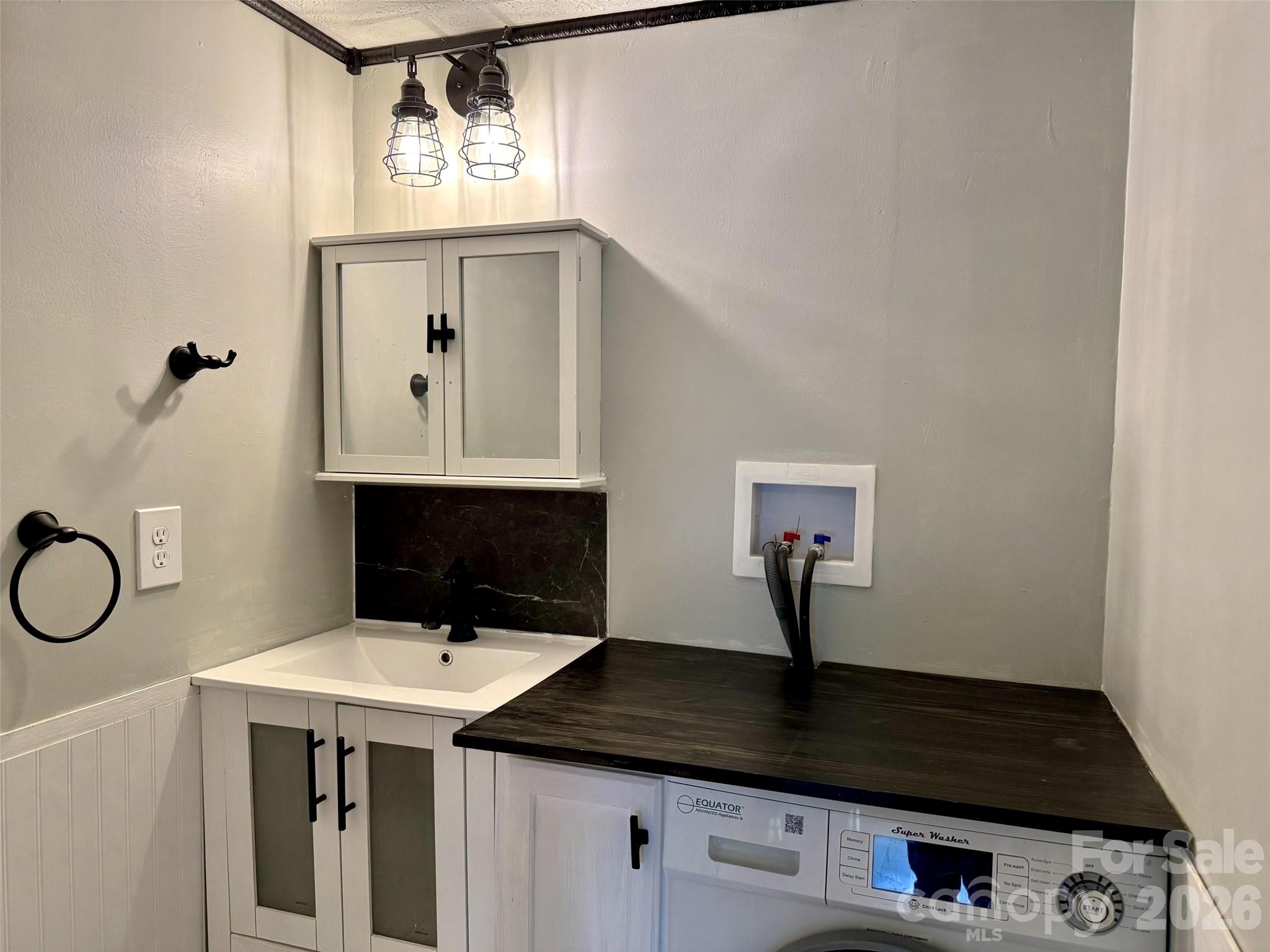 Primary half bath. - 427 6th Avenue W, Hendersonville