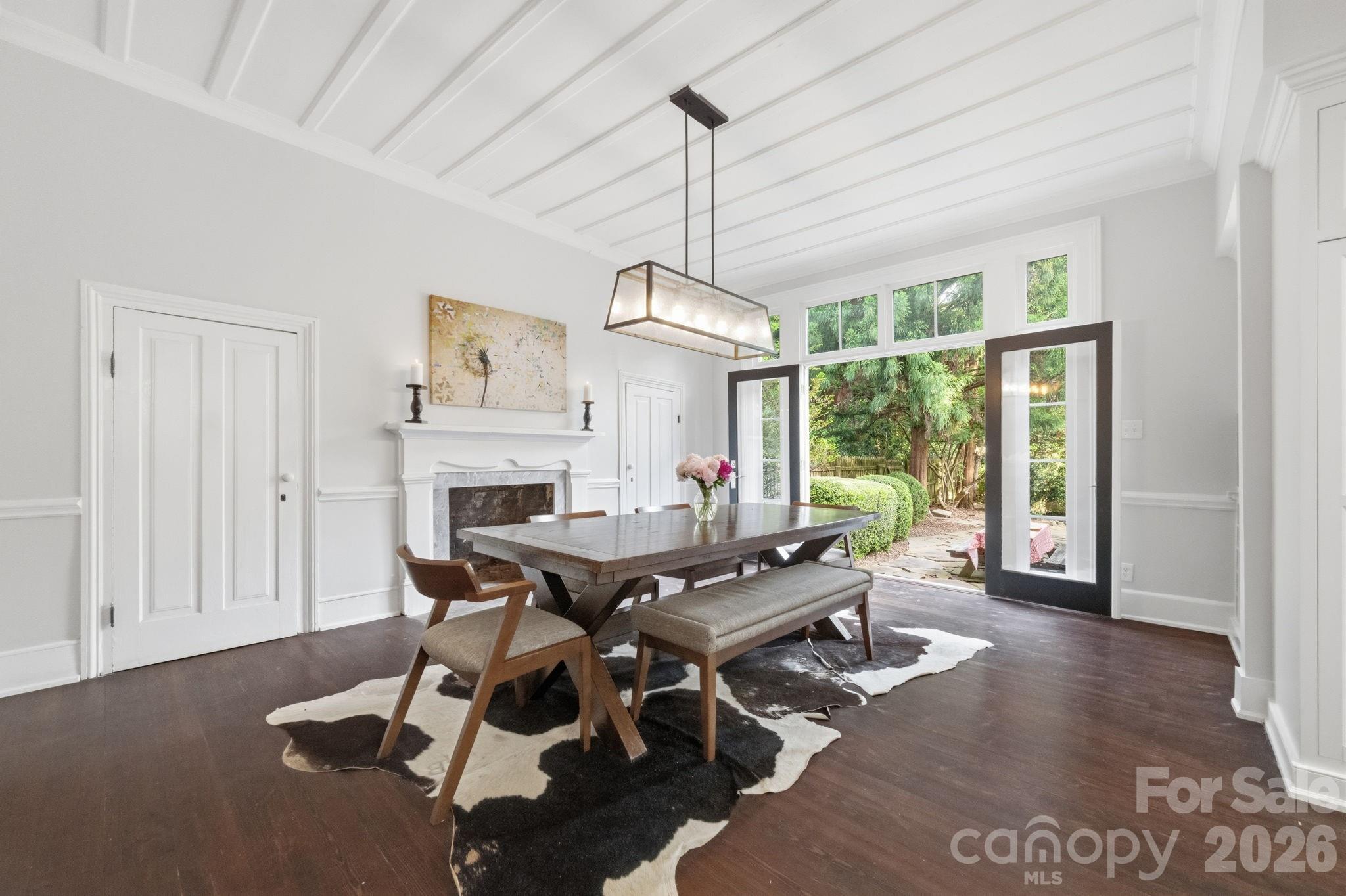 French doors open to flagstone side courtyard ideal for guests to enjoy both indoors and outdoors.  Two large china closets - 10915 Beatties Ford Road, Huntersville
