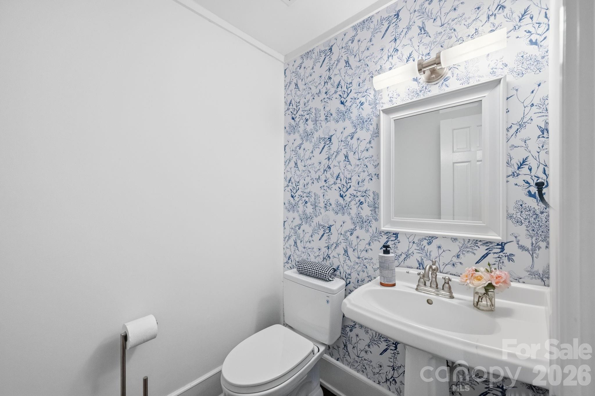 Renovated powder bath just off kitchen and great room. - 10915 Beatties Ford Road, Huntersville