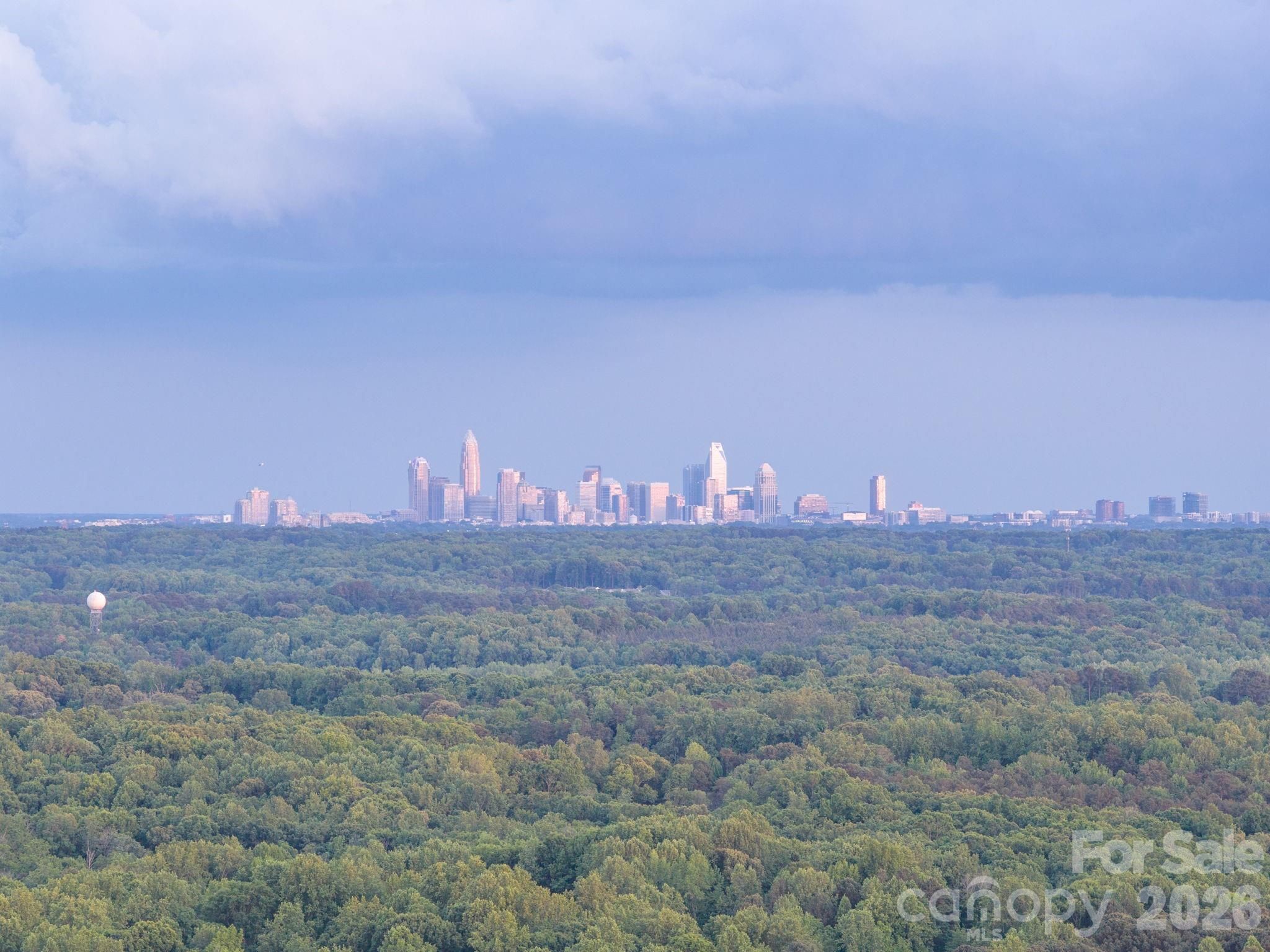 Work in the city and want to recharge at the end of the day?  McElroy House and farm offers a rare opportunity to do so within 25 minutes of downtown. - 10915 Beatties Ford Road, Huntersville