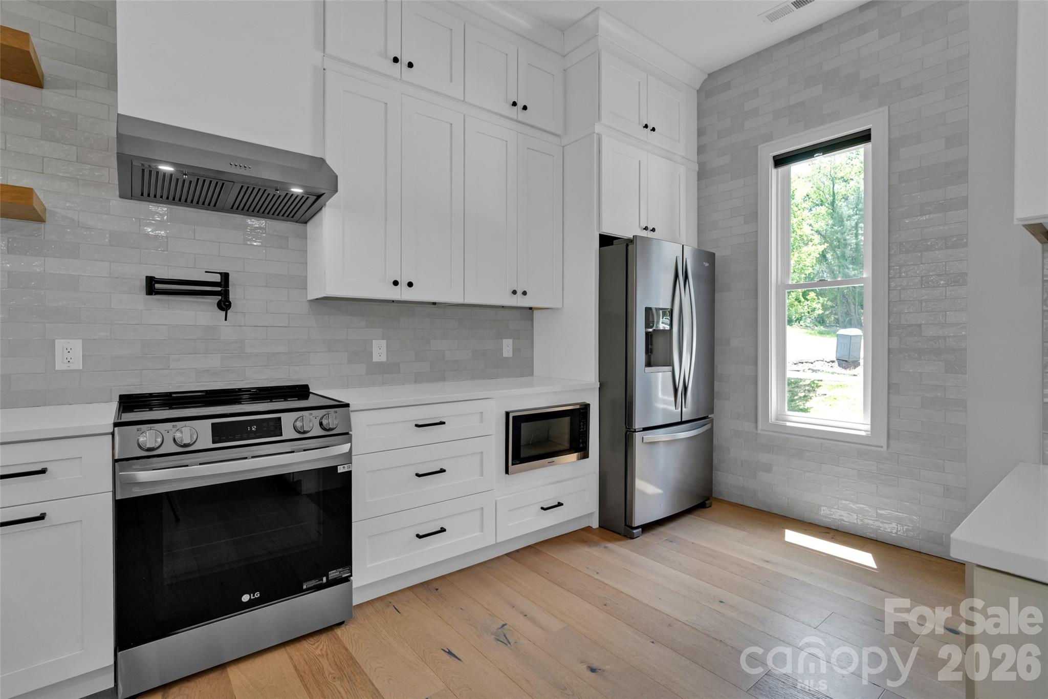 Single Family Residence at 24 Copper Mill Court, Candler, photo 10 of 29