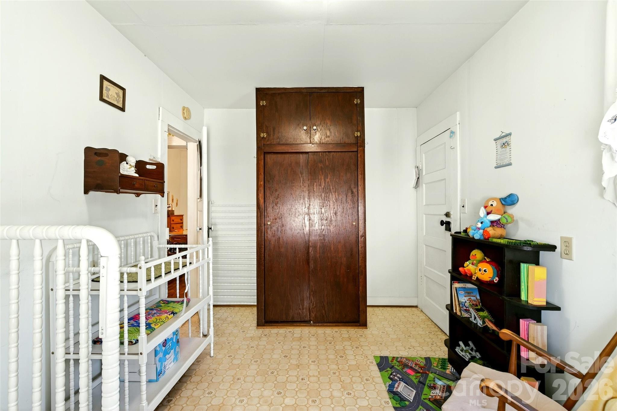 A wardrobe is built into the room for storage - 35 Second Street, Marion