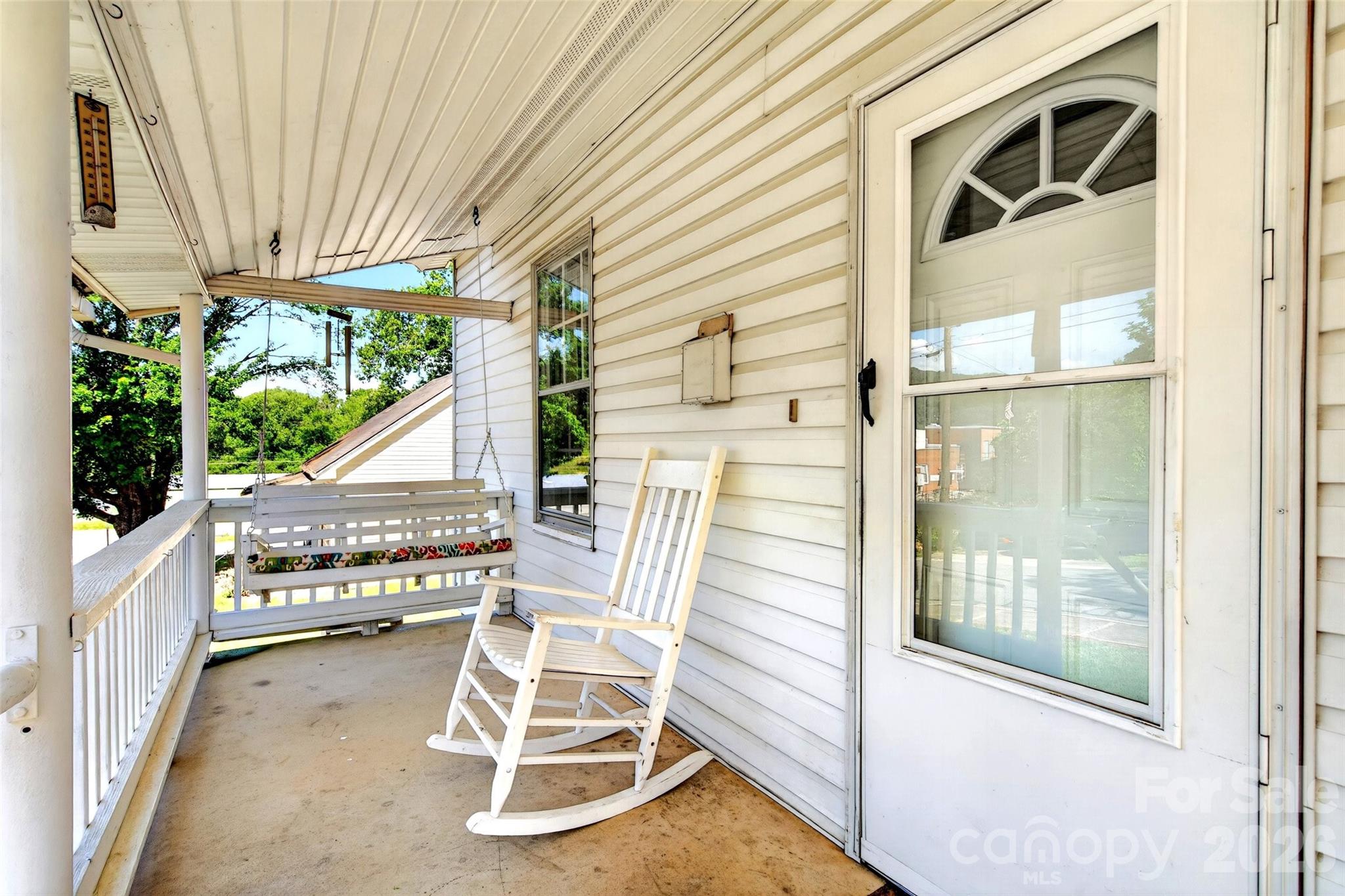 There is a great porch swing on the covered porch - 35 Second Street, Marion
