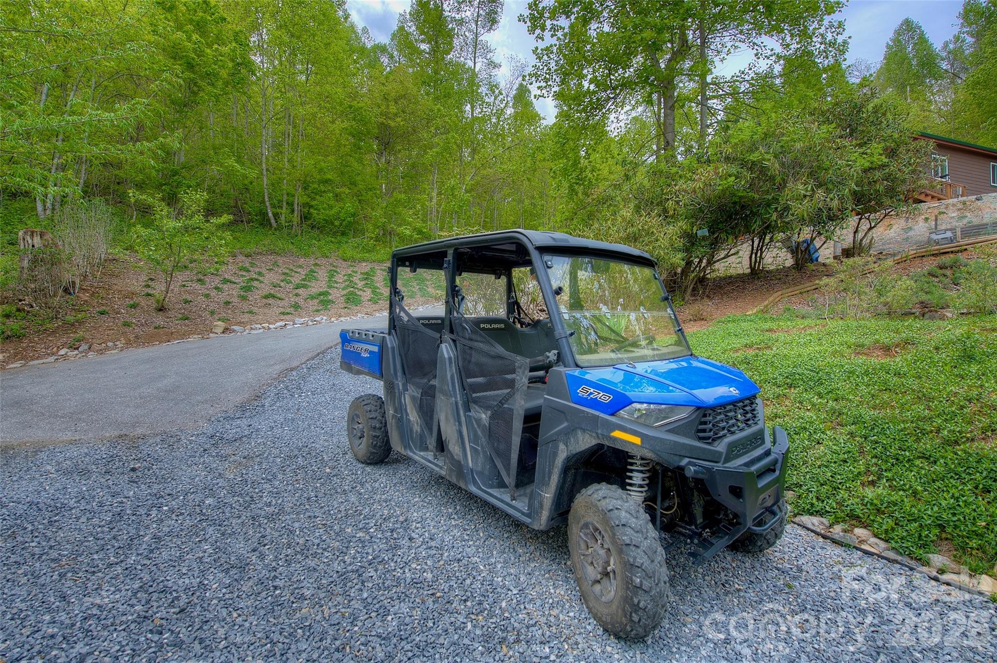 The six seater for exploring and work around the property - 262 Azalea Hills Lane, Spruce Pine