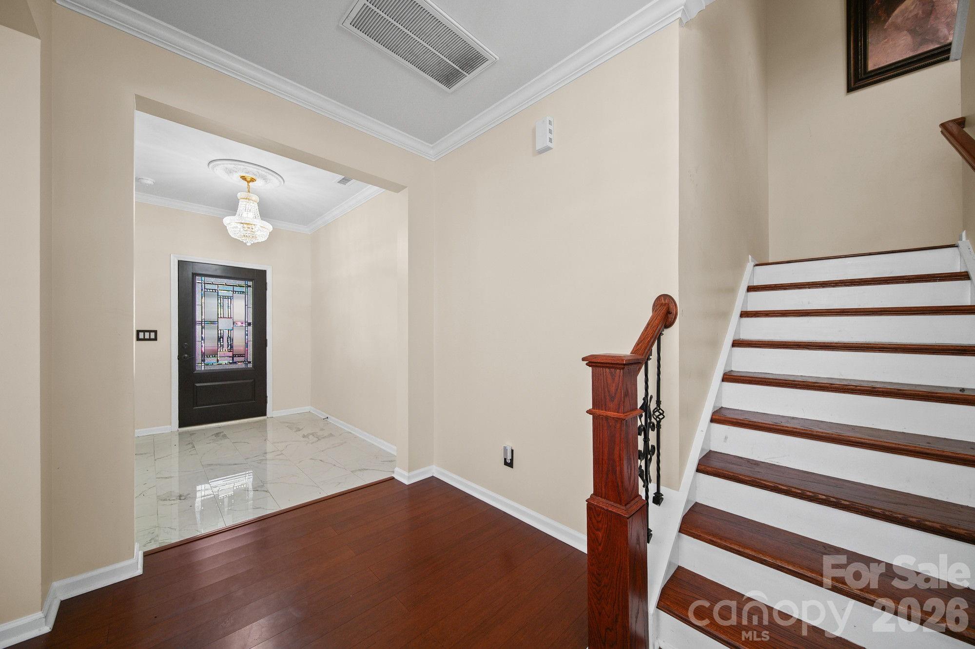 Staircase on main level - 157 Old Harbor Drive, Mount Gilead