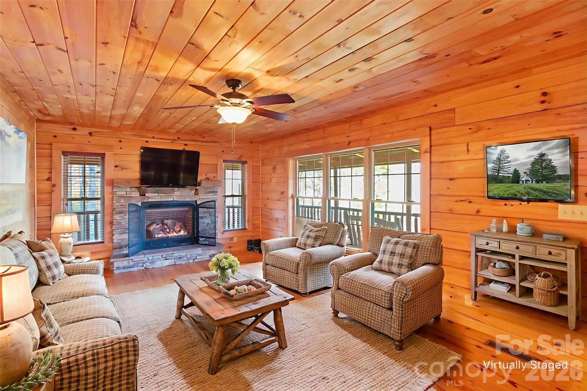 Living  with Gas Firelogs Virtually Staged - 17 Aaron Way, Waynesville