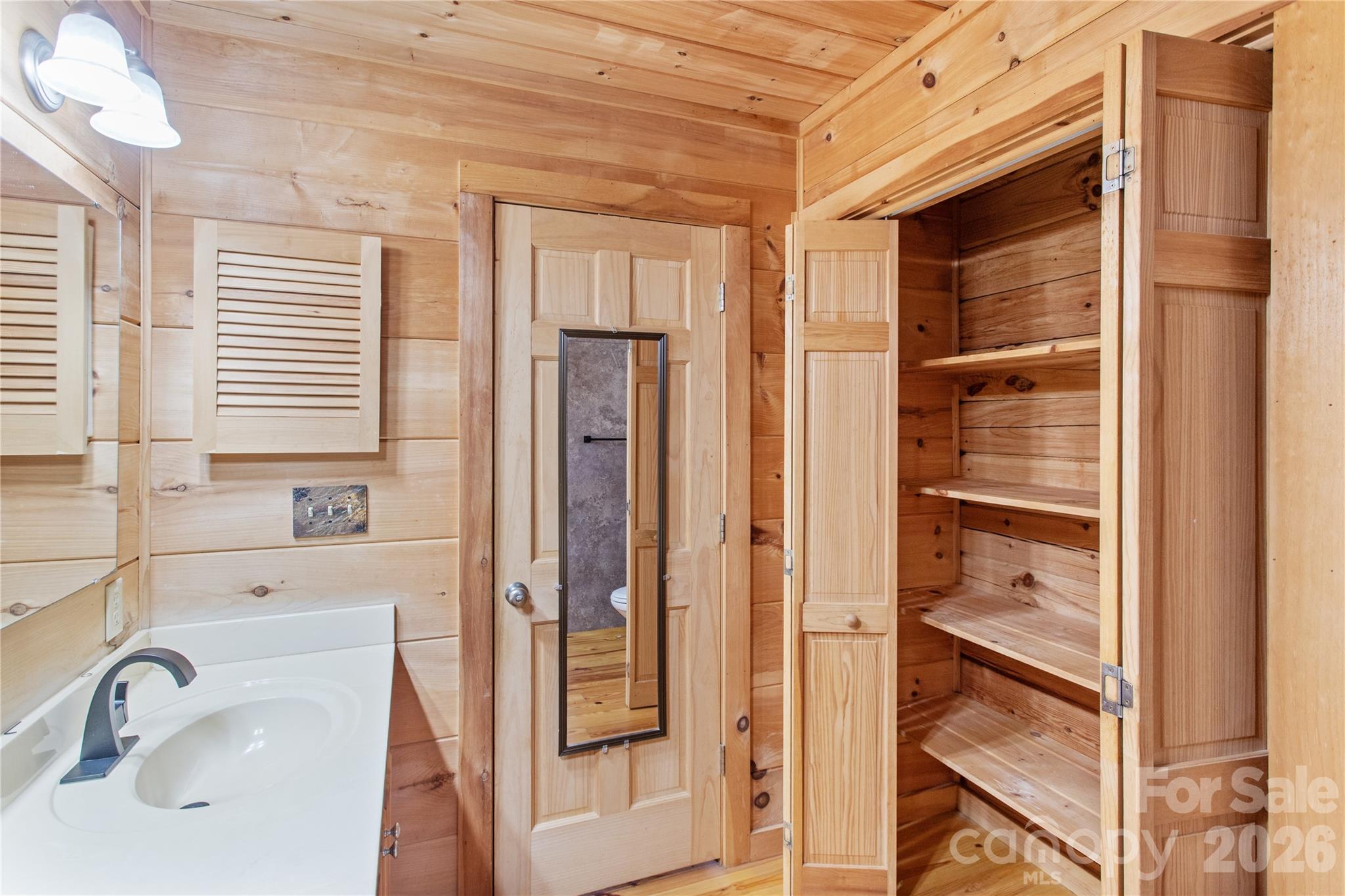 Linen Closet in Primary Bathroom - 17 Aaron Way, Waynesville