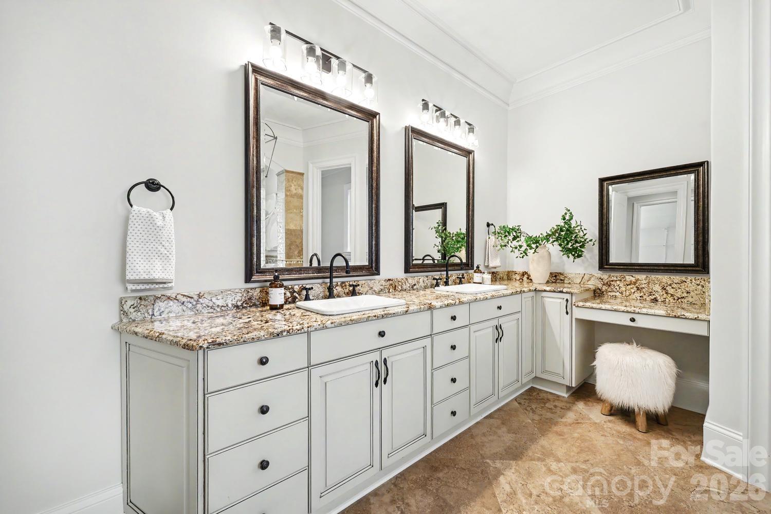 Primary bathroom with duual vanities - 8041 Water View Drive, Belmont