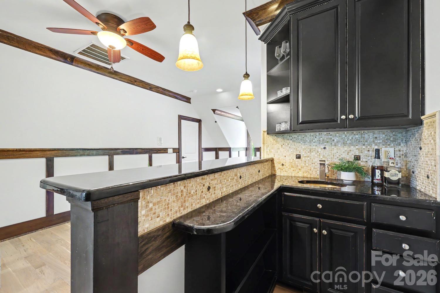 2nd floor bar can also be used as a kitchenette - 8041 Water View Drive, Belmont