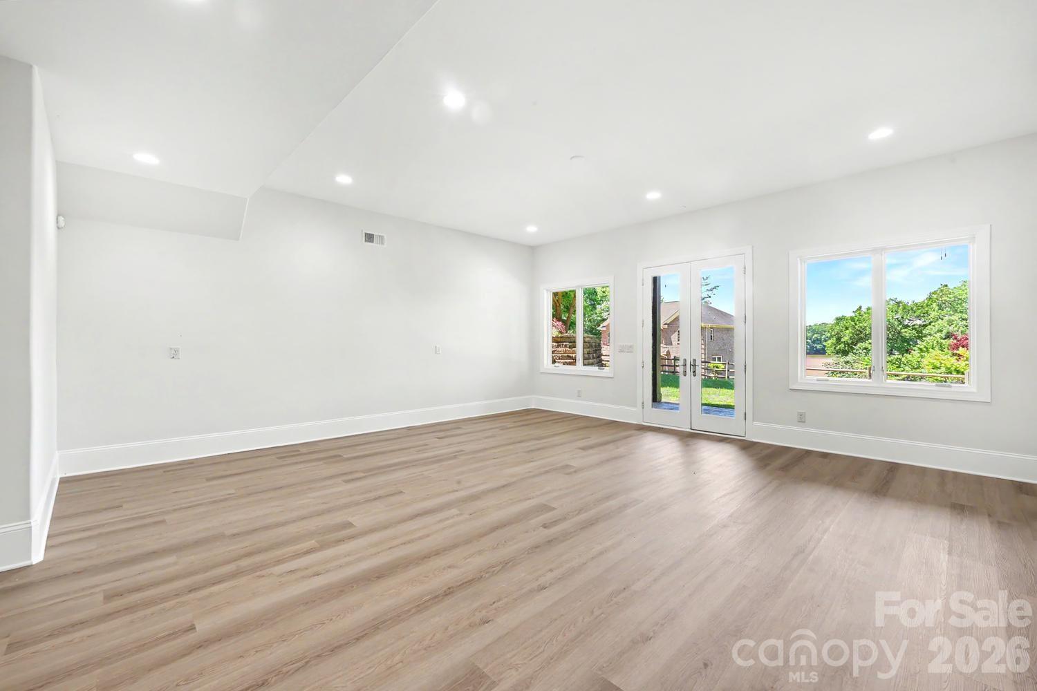 Lower level family room - 8041 Water View Drive, Belmont