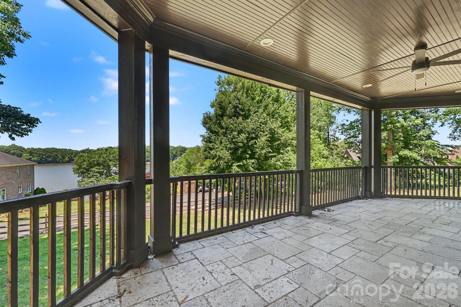 Veranda off Great Room with water view - 8041 Water View Drive, Belmont