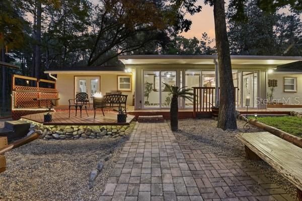 Dusk walkway and deck - 3630 NW 136TH ST, GAINESVILLE