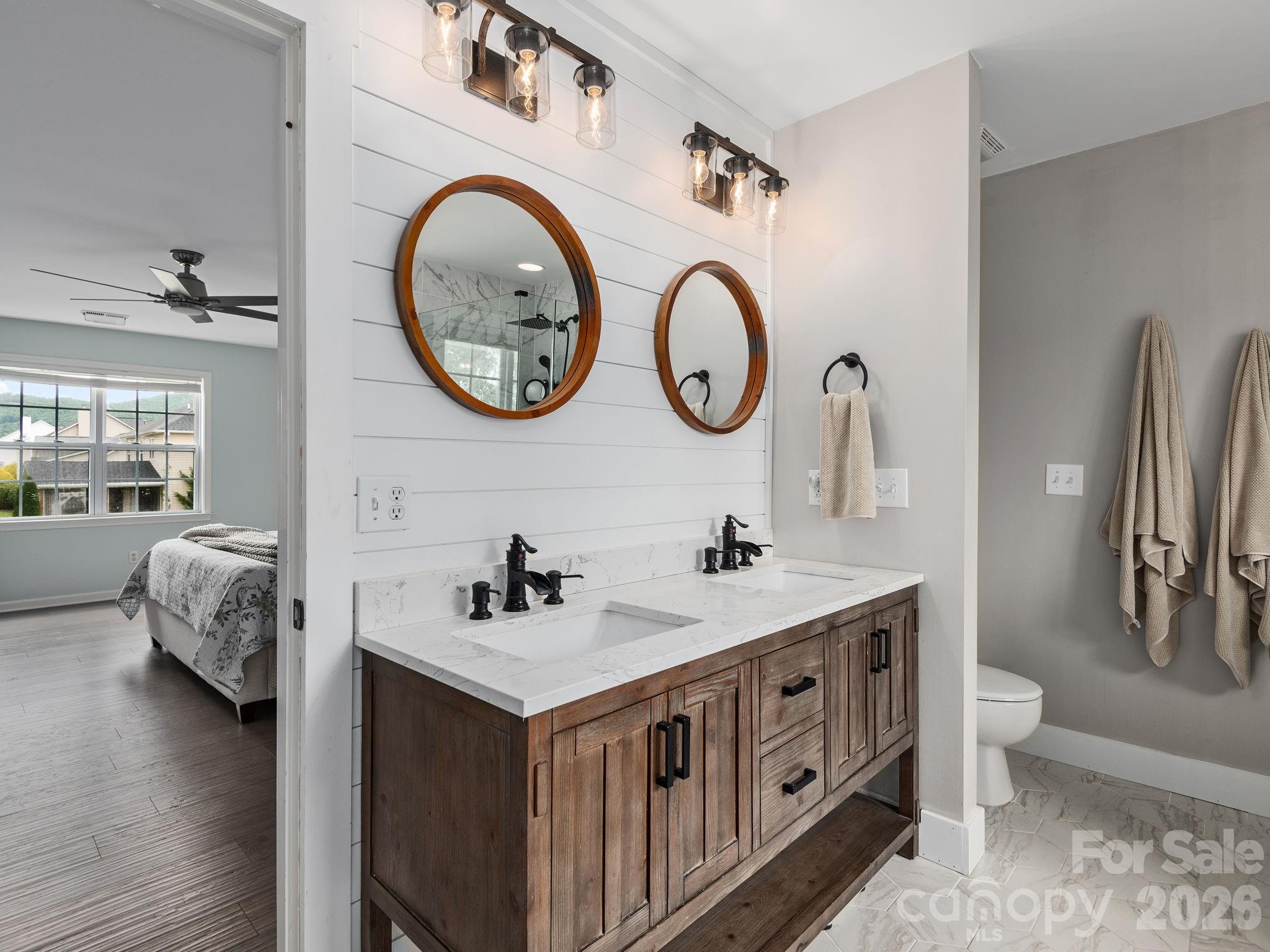 Primary Bath with walk-in Closet. - 288 Walnut Crest Road, Fletcher