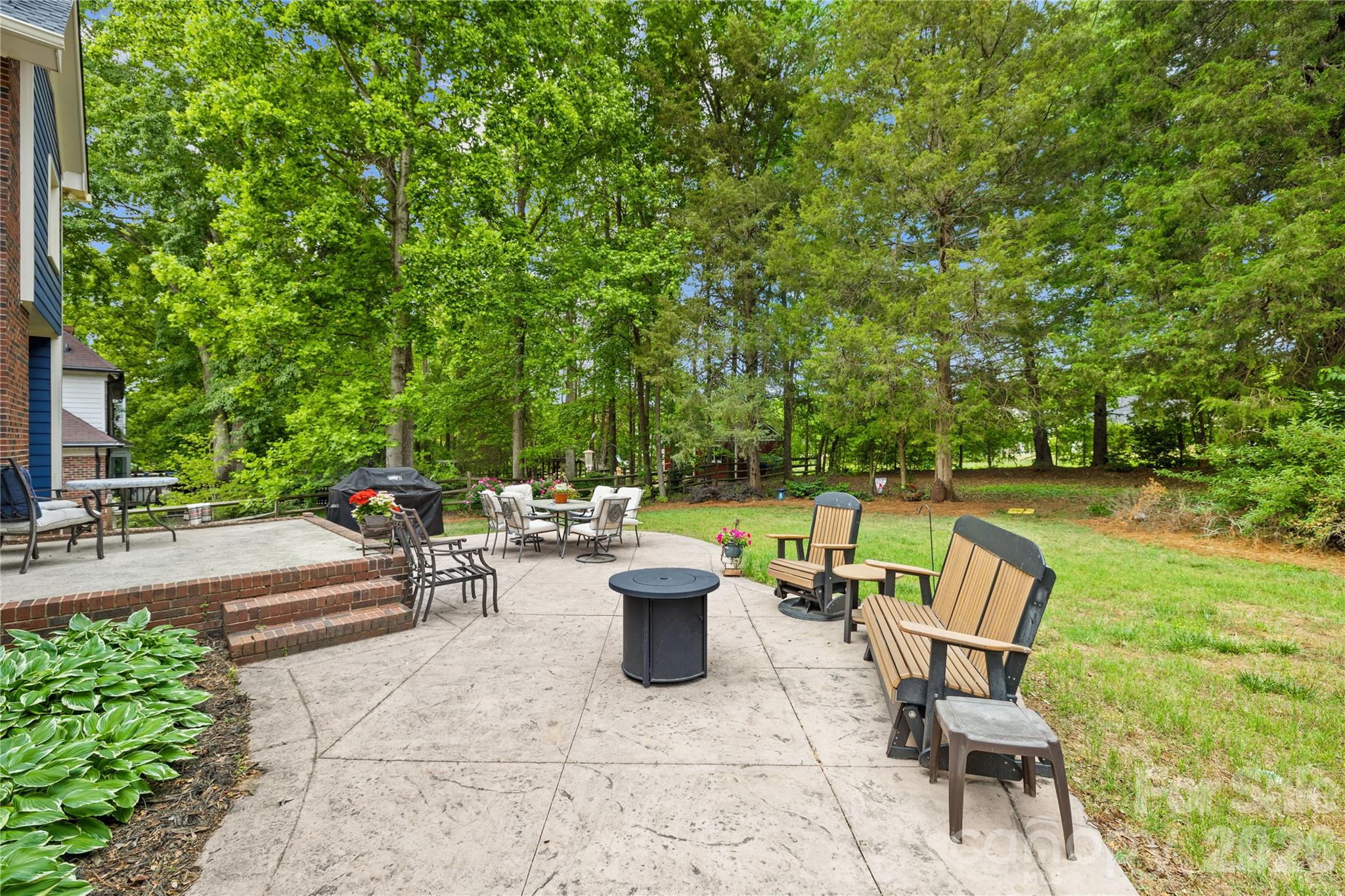 Back porch and patio made to entertain and relax - 1066 Briarcliff Road, Mooresville