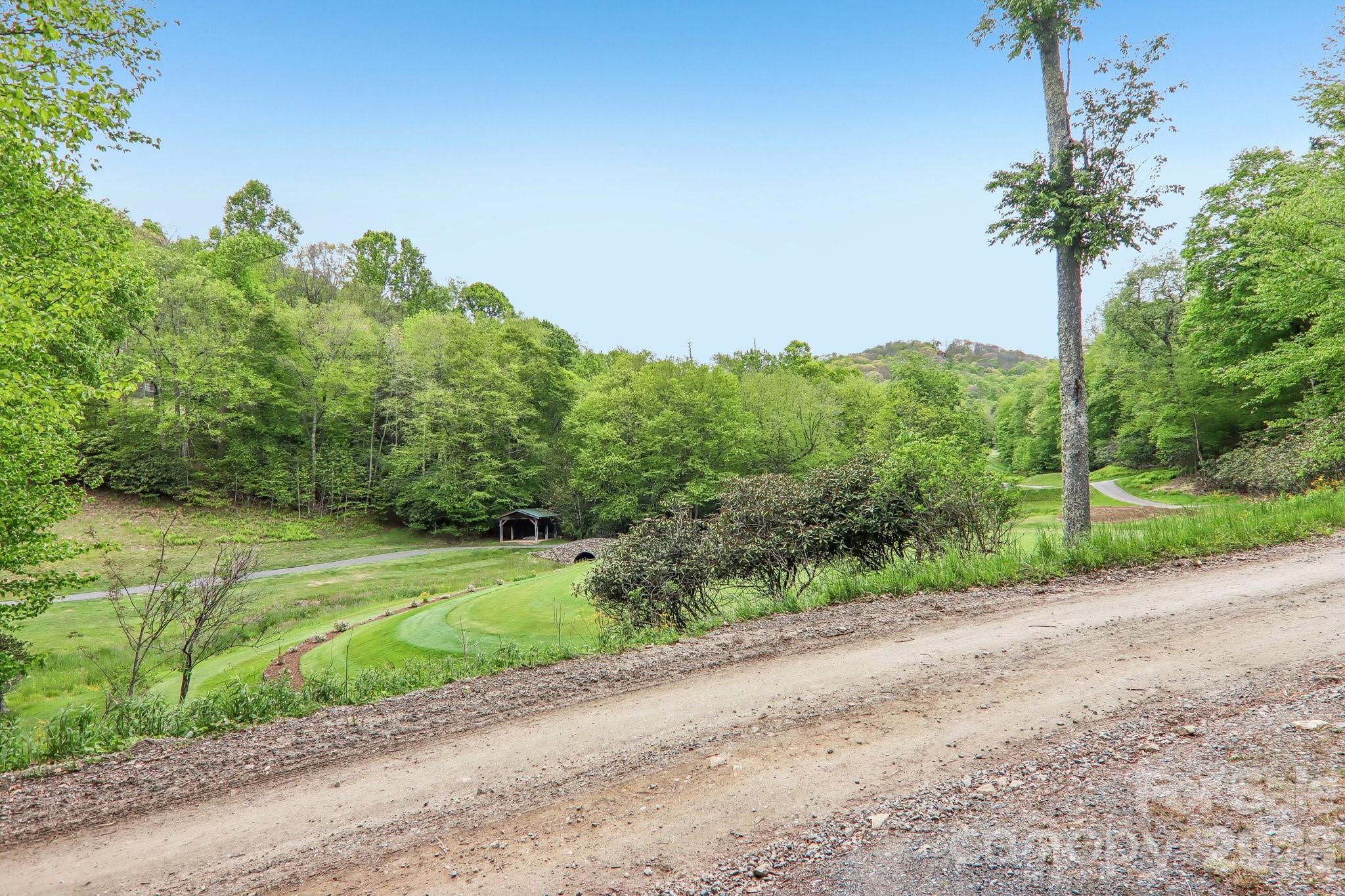 Views of the golf course from you front porch. - 210 Spring Valley Drive, Mars Hill