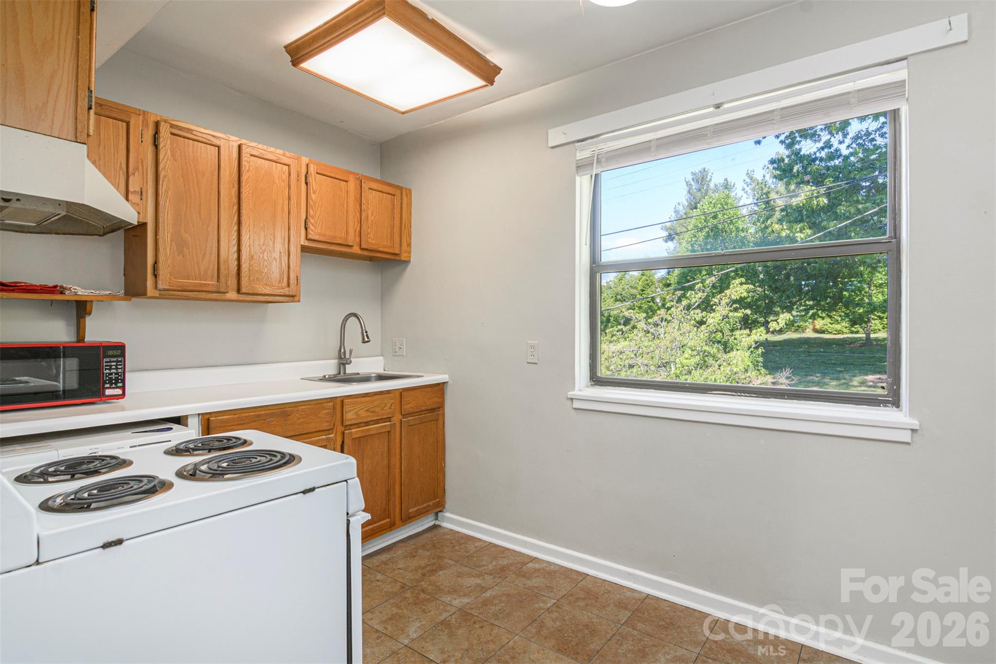 Huge window in Kitchen - 615 Biltmore Avenue, Asheville