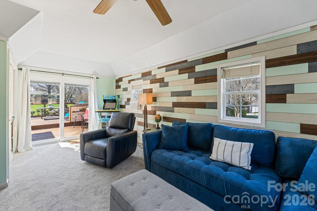 Bonus room has a closet, overlooks the lake, and walks out onto the sprawling decks. - 141 Bluewing Lane, Mooresville