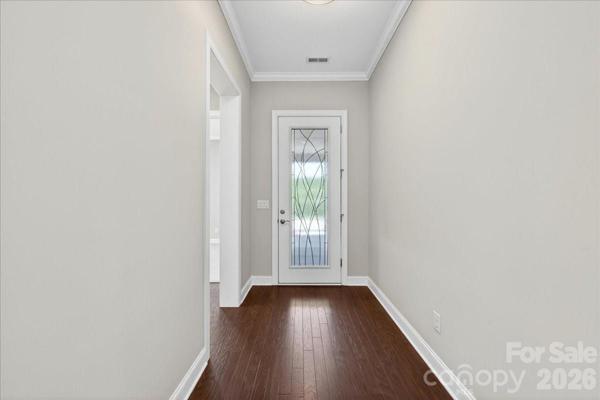 Entry Hallway w/ Stained Glass Front Door - 249 Stone Mountain Way, Denver