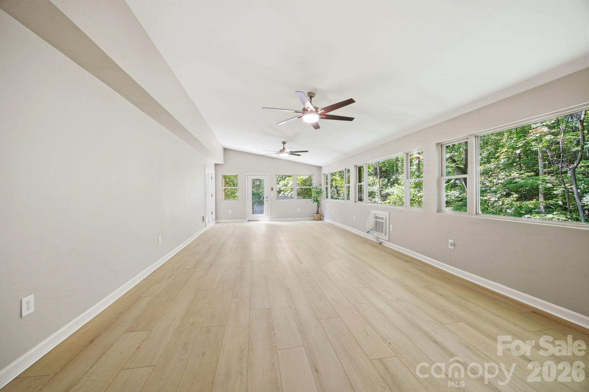 Sunroom overlooking the creek and woods - 195 Azalea Road, Mooresville