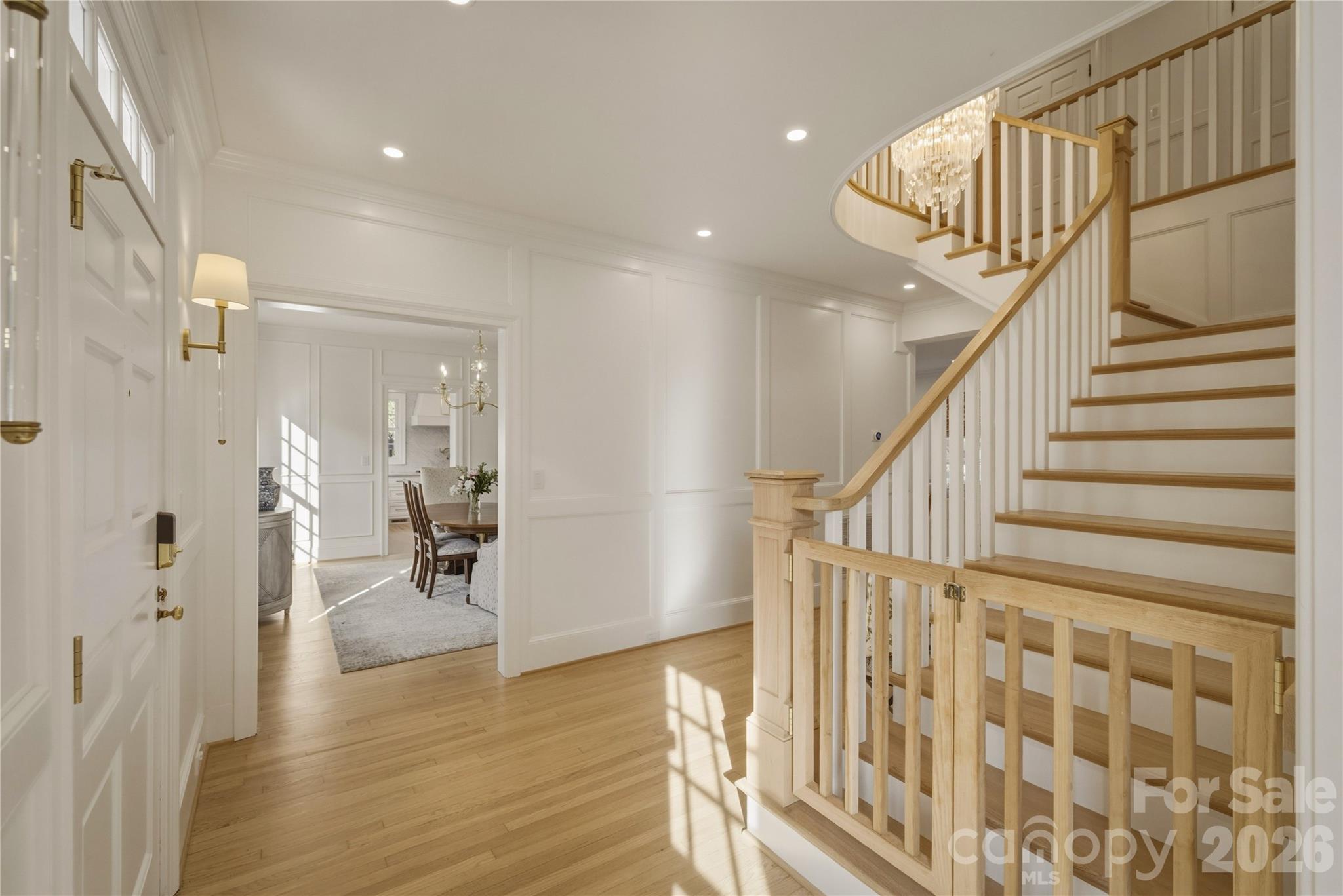 Beautiful entry foyer with custom child gate. - 319 W Union Street, Morganton