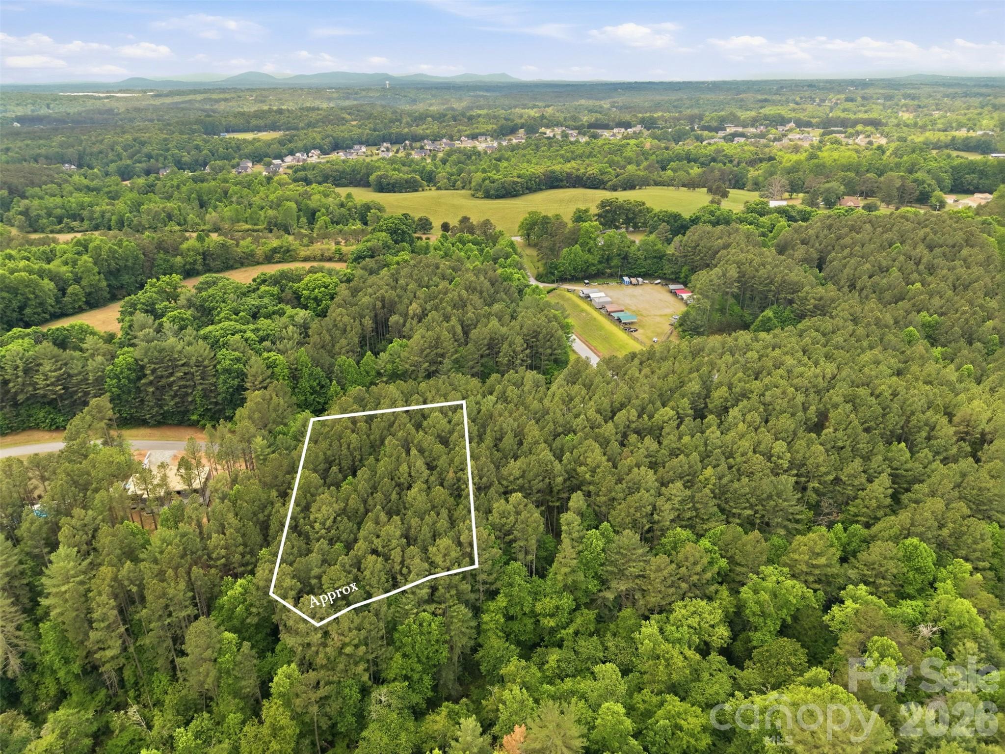 Rolling Blue Ridge foothills frame the community - 6020 Plantation Pointe Drive, Granite Falls