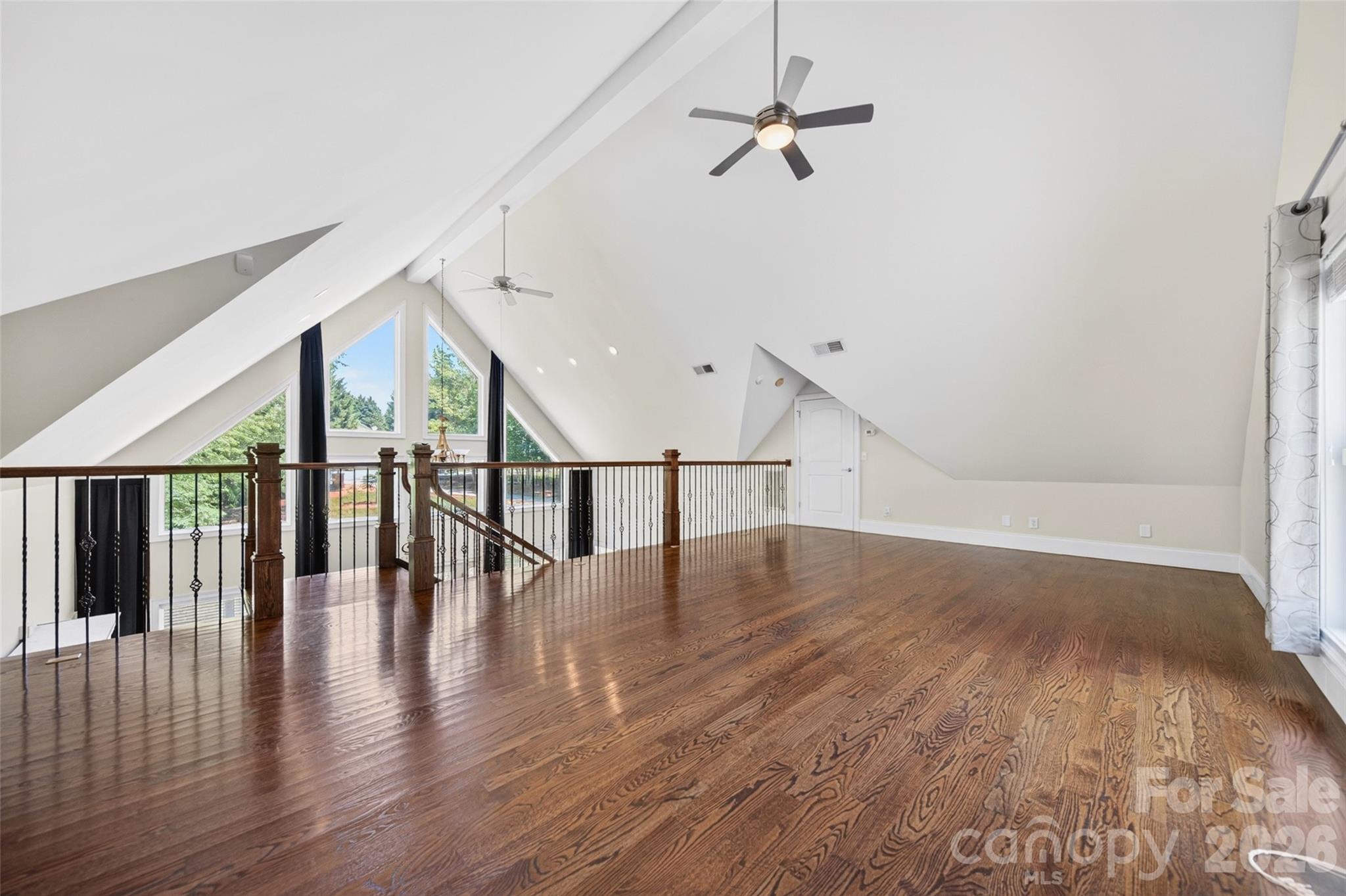 Huge upper loft features natural light and custom metal spindles - 2977 Cabin Creek Drive, Catawba