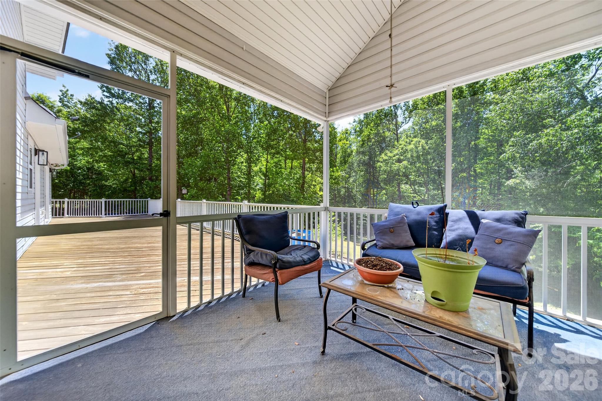 Porch enclosed by screens to provide protection from insects while allowing fresh air and natural light. - 2977 Cabin Creek Drive, Catawba