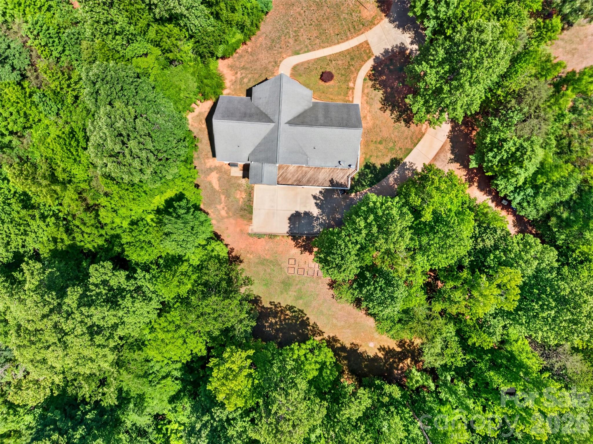 Stunning, completely private property surrounded by mature trees, offering a peaceful and secluded retreat. - 2977 Cabin Creek Drive, Catawba
