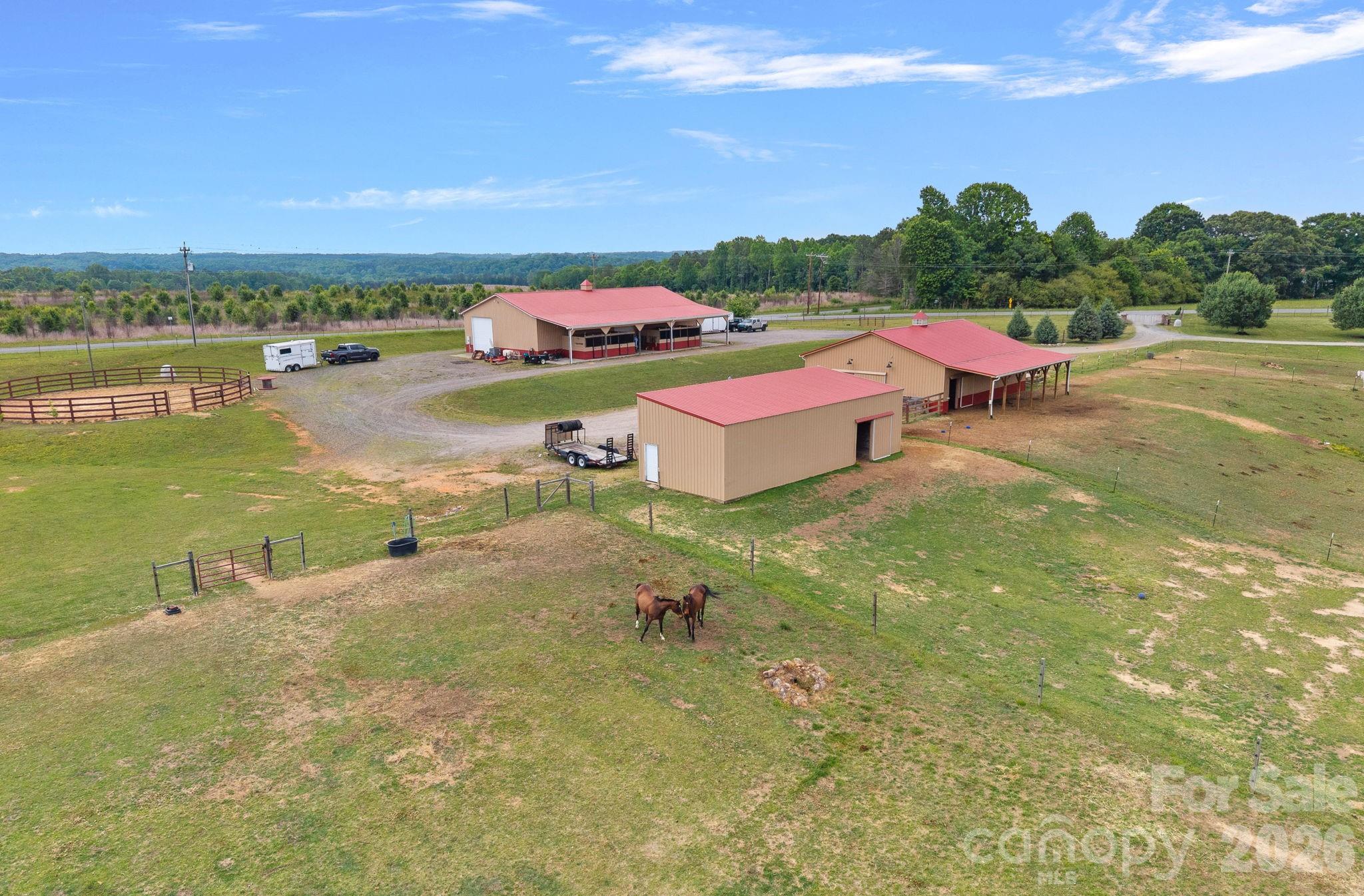Two barns with 9 stalls and 3,184 sq ft workshop. - 2151 Brown Chapel Road, Catawba
