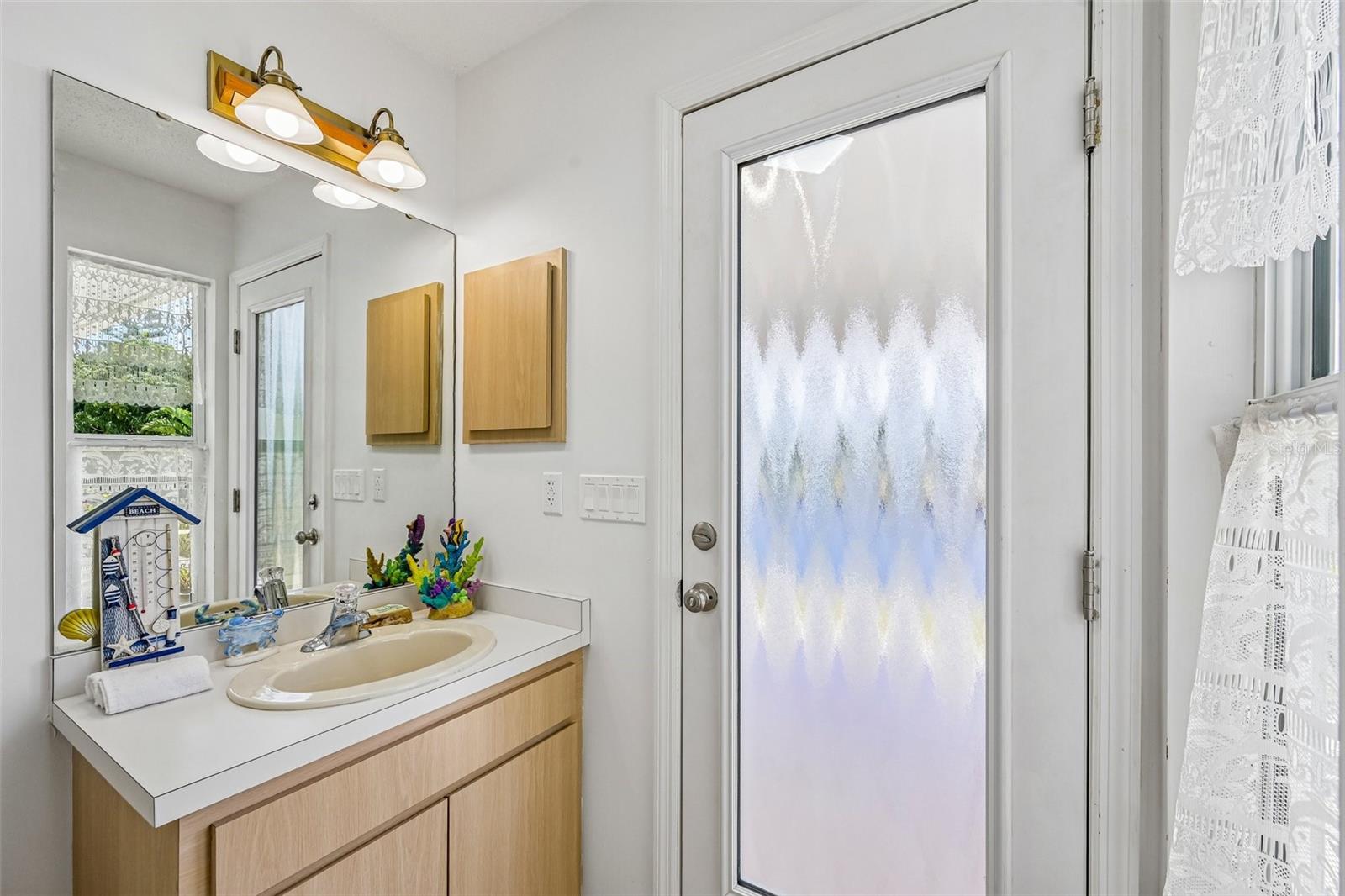 Half bath to pool - 3072 MAUCK TER, PORT CHARLOTTE