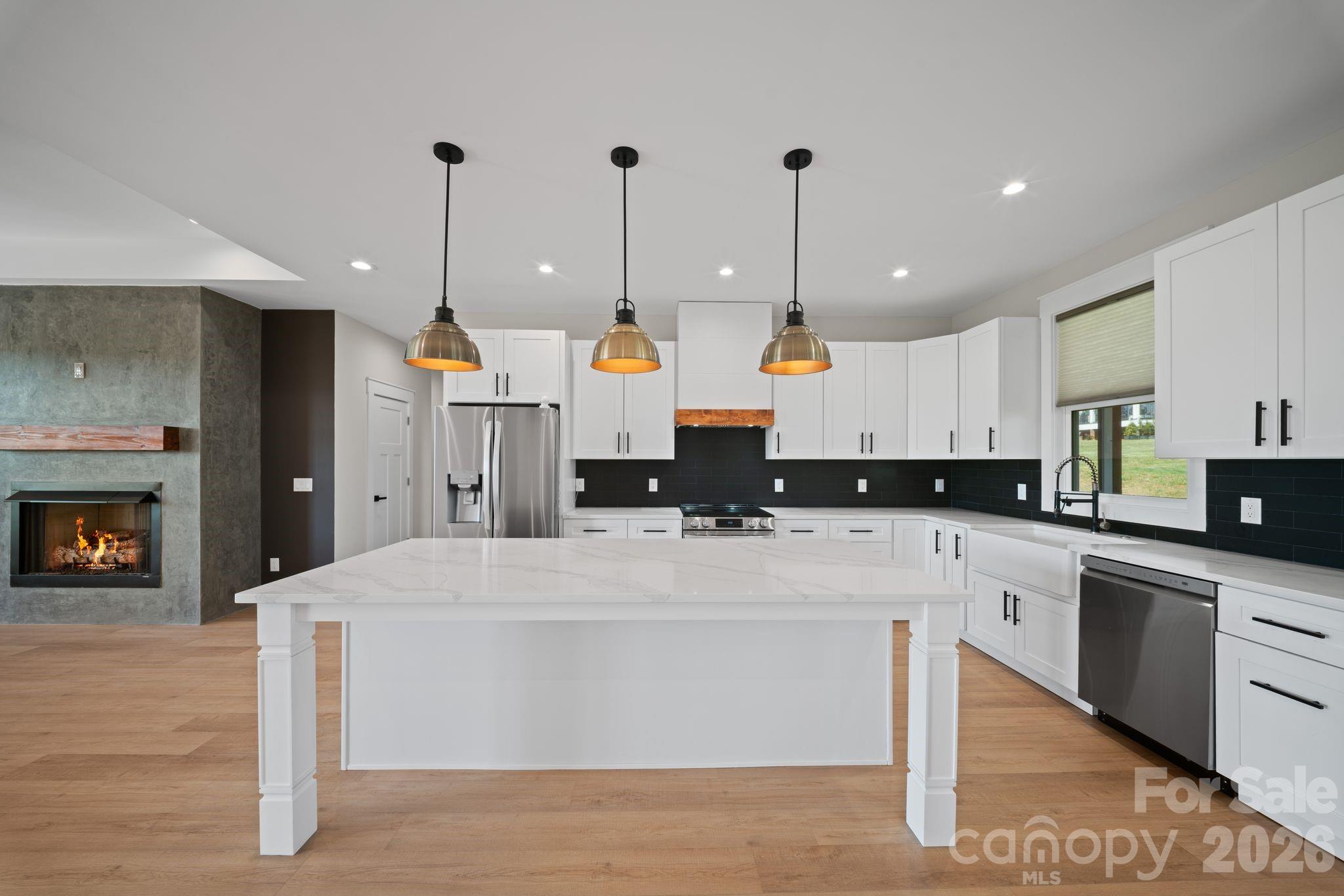 Beautiful eat at bar with quartz countertops - 111 Pisgah Gap Drive, Candler