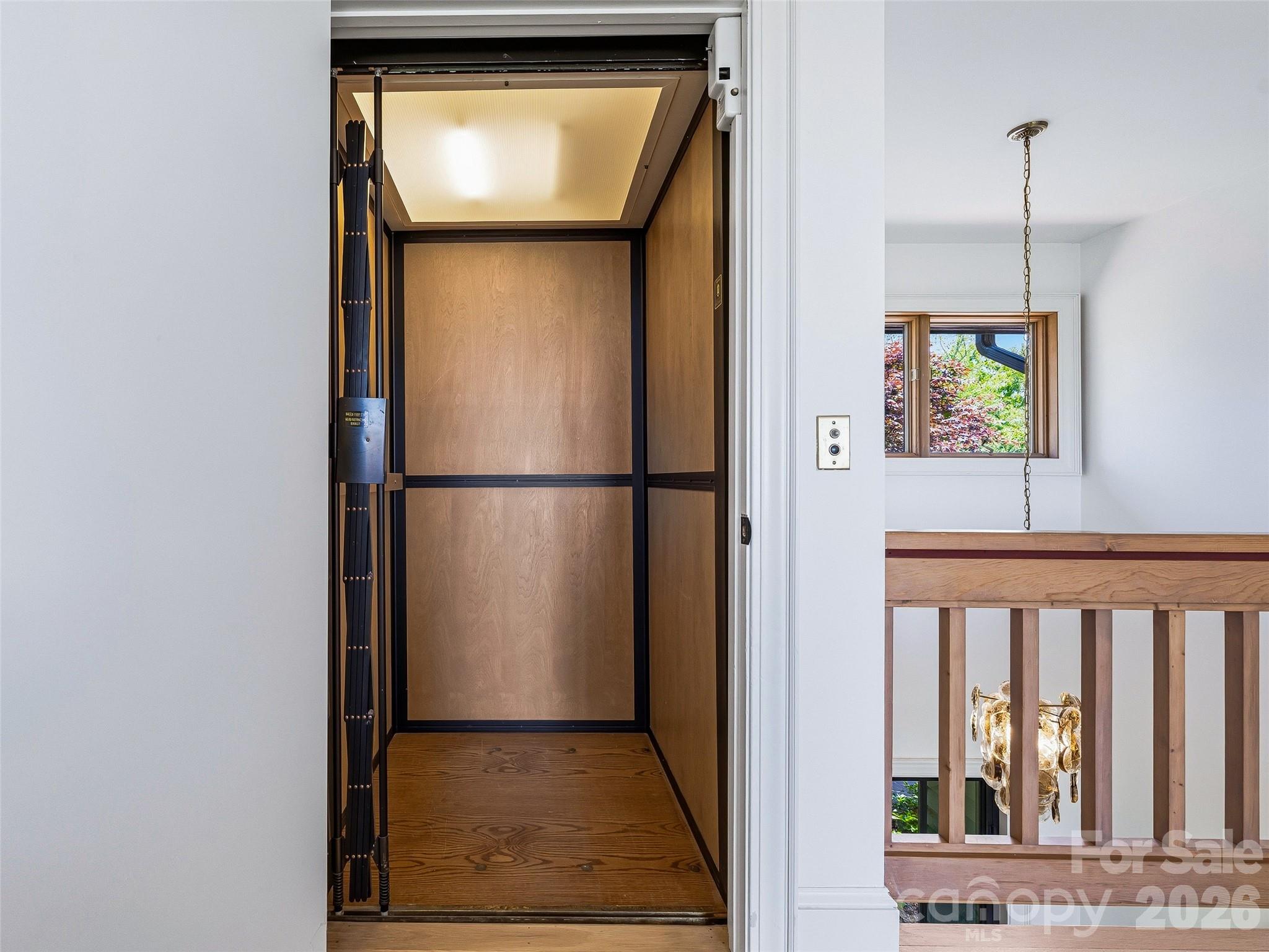 The Elevette elevator is located just off of the foyer and offers access to every level. - 100 Big Spring Drive, Asheville