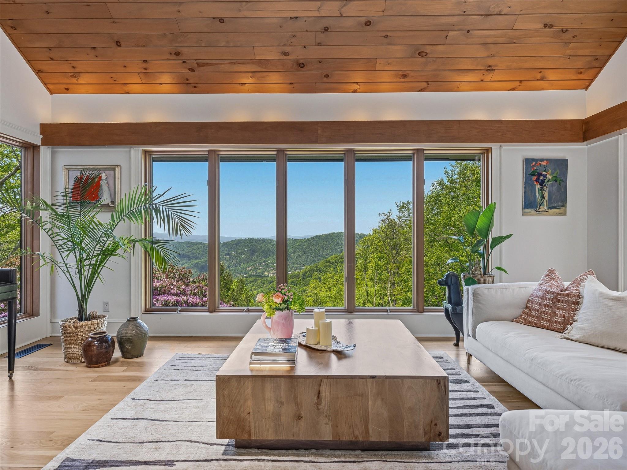 Stately clerestory windows frame picture-perfect views. - 100 Big Spring Drive, Asheville