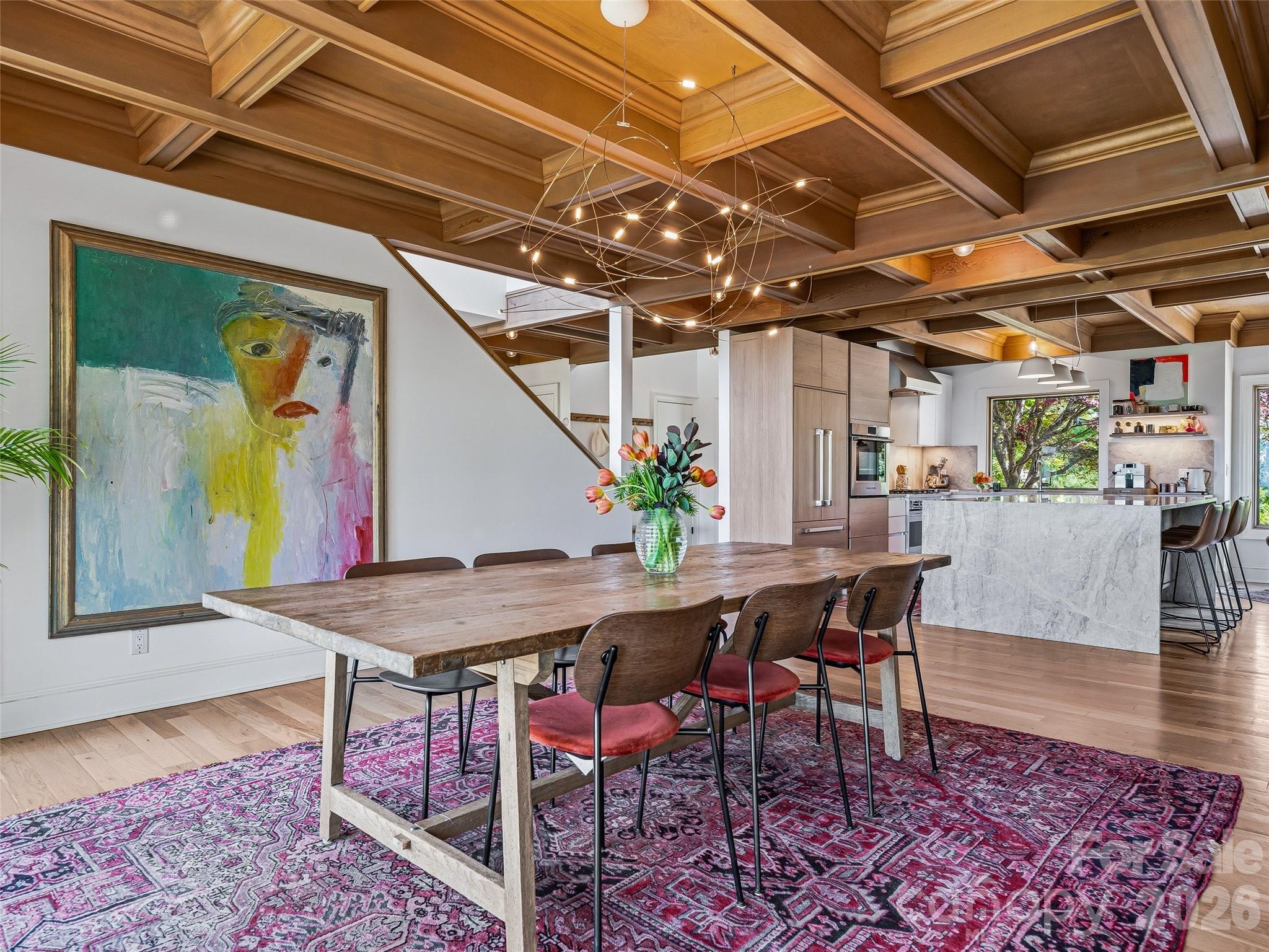 Open concept floor plan makes for a seamless hosting experience. - 100 Big Spring Drive, Asheville