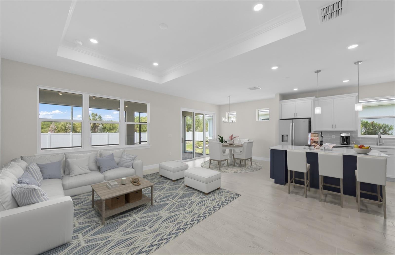 Virtually staged Gathering Room and Kitchen - 1828 SILVER SHORES BLVD, ENGLEWOOD