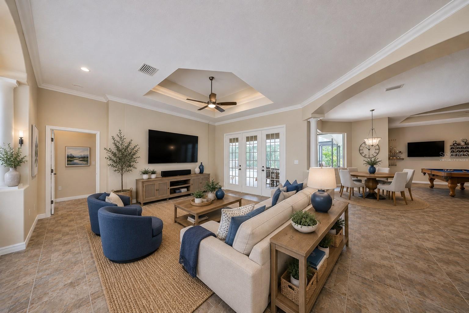 virtually staged living room - 17706 BRIDLEWOOD CT, PARRISH