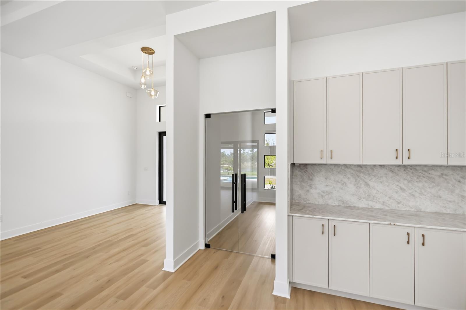 Executive Office or Optional 5th Bedroom with Custom Built-In Cabinetry. - 16692 LIGGETT CIR, PORT CHARLOTTE