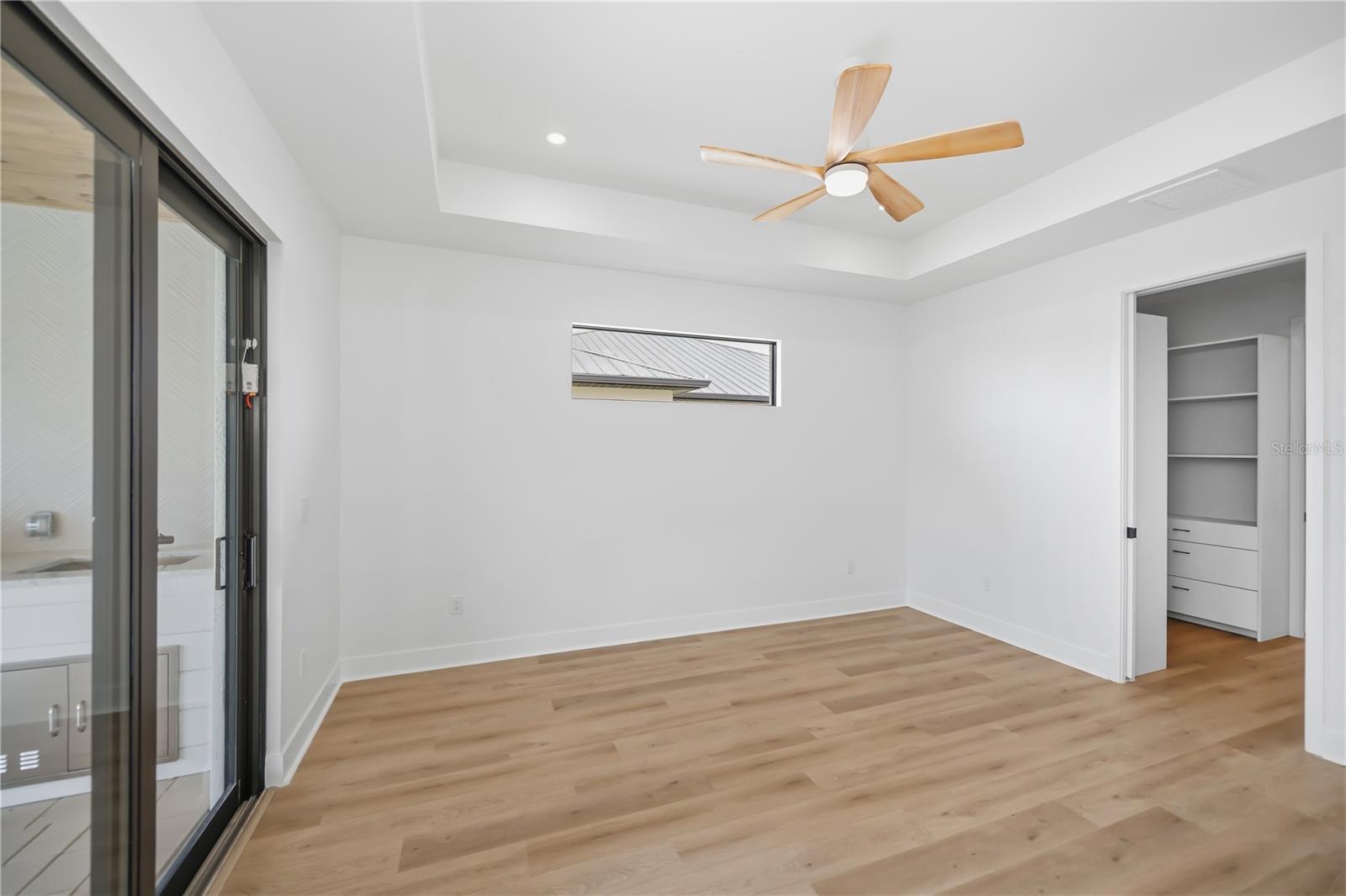 Primary Bedroom Suite with Access to Pool Area - 16692 LIGGETT CIR, PORT CHARLOTTE