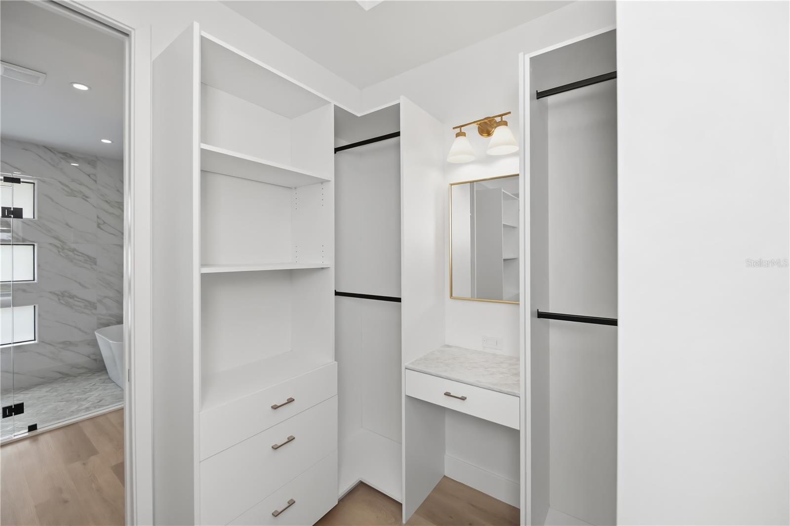 Walk in Closet 1 With California Style Cabinetry - 16692 LIGGETT CIR, PORT CHARLOTTE