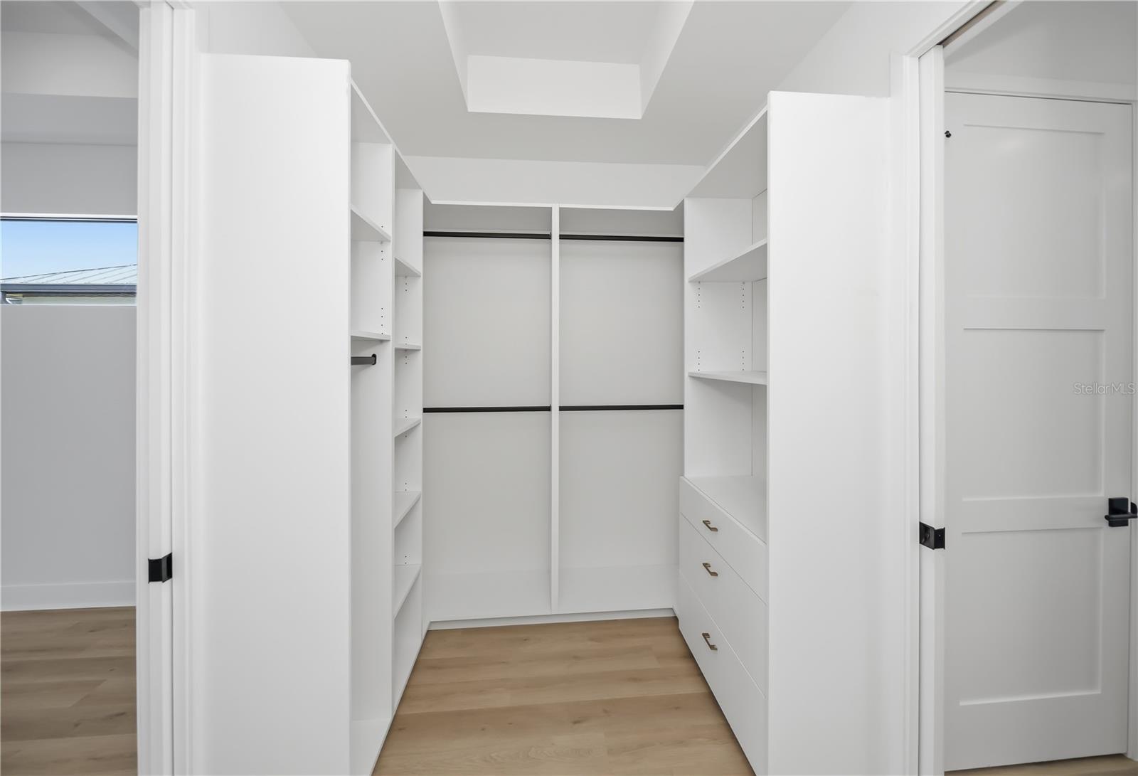 Walk in Closet 2 With California Style Cabinetry - 16692 LIGGETT CIR, PORT CHARLOTTE