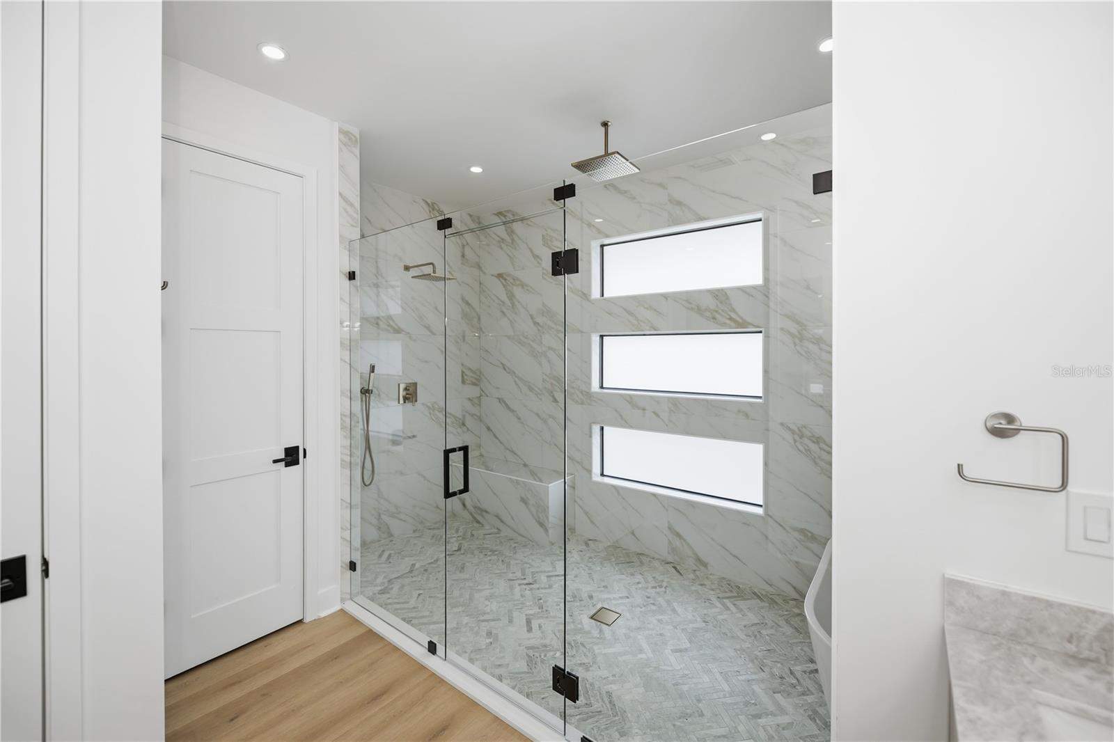 Luxury Walk-In Shower with Glass Enclosed Rain Shower. - 16692 LIGGETT CIR, PORT CHARLOTTE