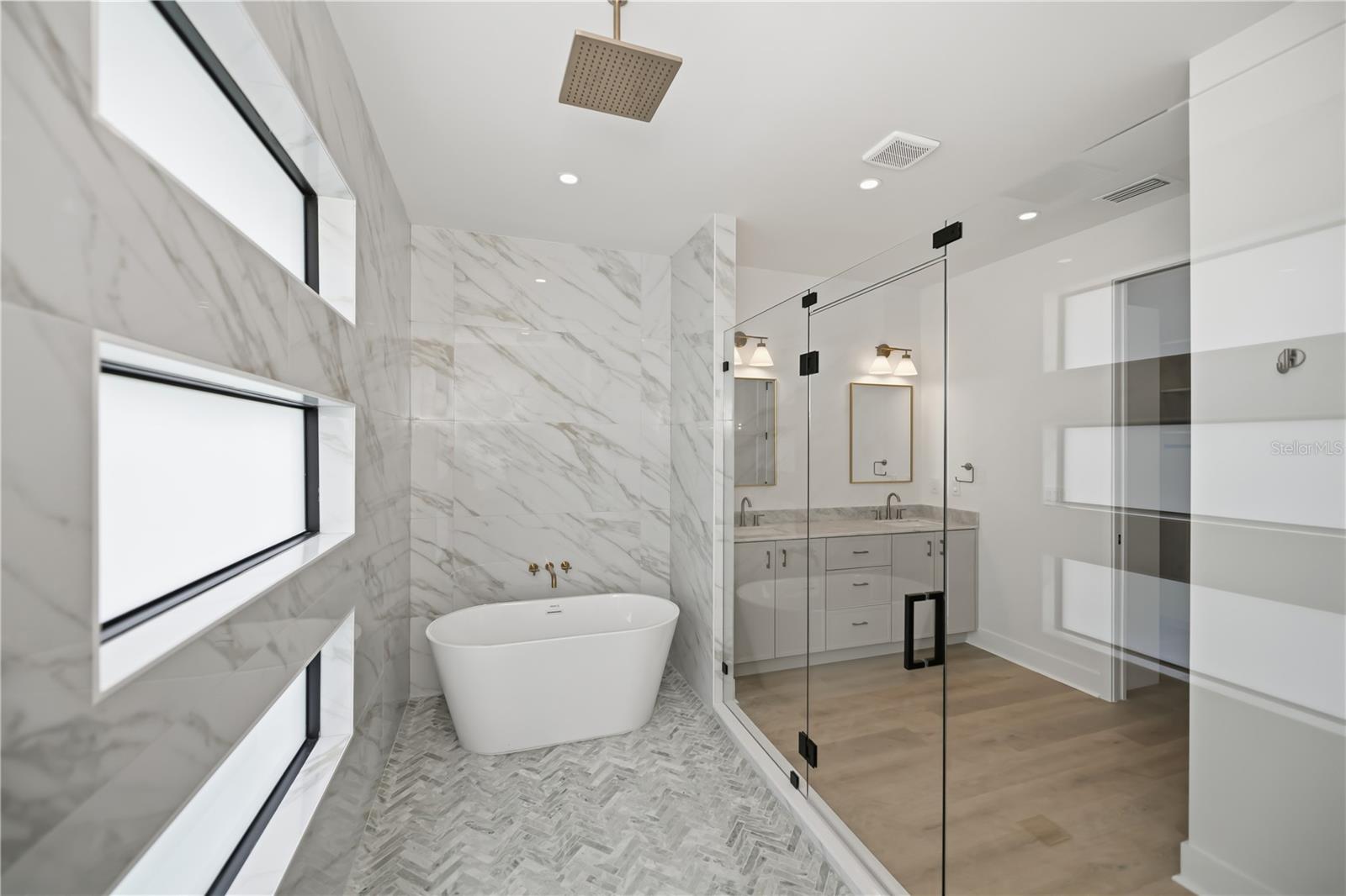 Primary Bathroom Walk-In Shower with Freestanding Bath Tub. - 16692 LIGGETT CIR, PORT CHARLOTTE